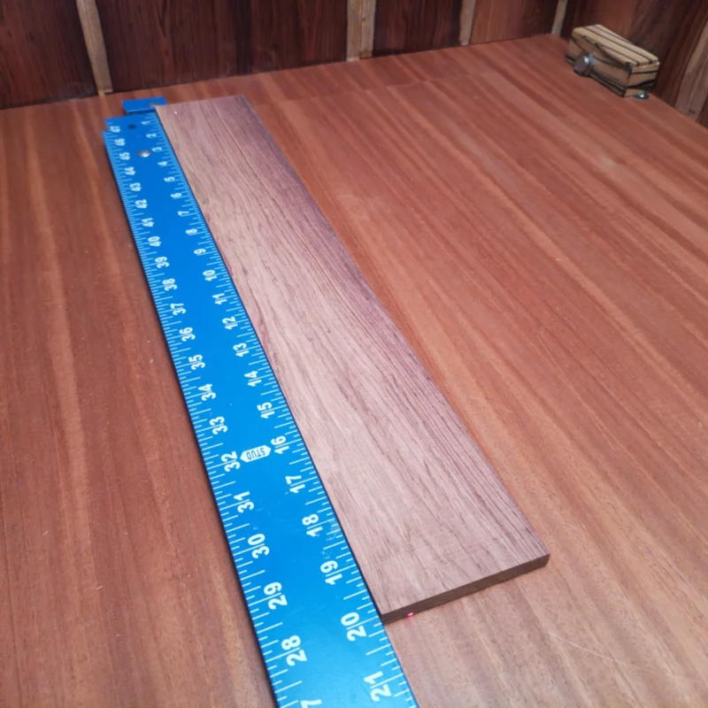 Elevate your acoustic creations with our Honduran Rosewood fingerboards blank. Known for its rich, warm tones and stunning grain patterns, this premium wood is ideal for luthiers seeking to enhance their instruments. Its durability and resonant qualities ensure your guitars will not only sound incredible but also look fantastic. Perfect for both professional and hobby builders, this blank is your next go-to for top-tier craftsmanship. It is a Honduran Rosewood Acoustic Rift Sawn fingerboard blank with dimensions of 20.0 x 3.2 x 0.4 inches.