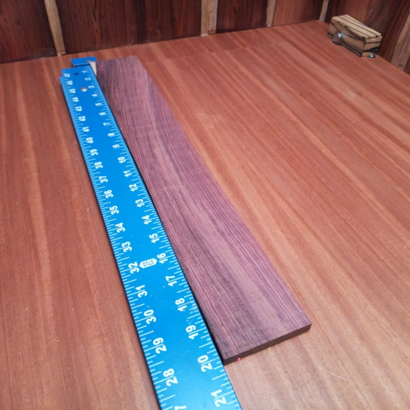 Fingerboard Blanks 136 Crafted from premium Honduran rosewood, this fingerboard blank is perfect for luthiers seeking quality and versatility. Its rich tonal properties enhance any acoustic instrument, while the rift sawn grain pattern adds stunning visual appeal. Ideal for creating exceptional fingerboards, this blank combines beauty with functionality, ensuring a smooth playing experience. Elevate your instrument projects with this high-quality blank that musicians will love and admire! It is a Honduran Rosewood Acoustic Rift Sawn fingerboard blank with dimensions of 20.0 x 2.8 x 0.4 inches.