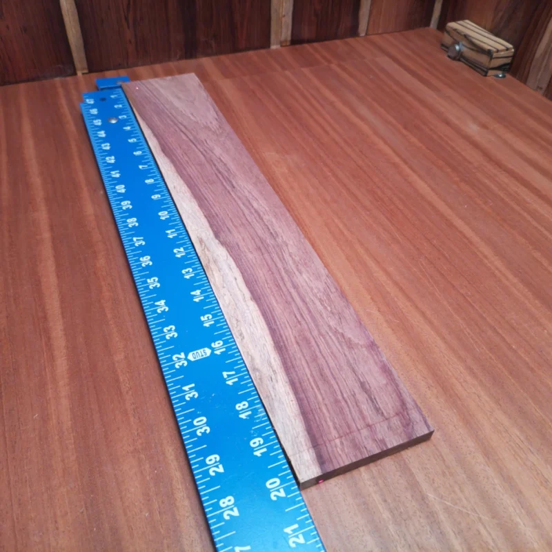 Unlock the magic of sound with our Honduran Rosewood acoustic blank! This beautifully rift sawn wood is perfect for luthiers looking to create an instrument with a rich, warm tone. Its dense grain structure not only enhances resonance but also adds stunning aesthetics to your musical masterpiece. Whether you’re crafting a guitar, ukulele, or something entirely unique, this blank promises durability and performance in every strum. Your next creation deserves quality like this! It is a Honduran Rosewood Acoustic Rift Sawn fingerboard blank with dimensions of 20.0 x 3.3 x 0.4 inches.