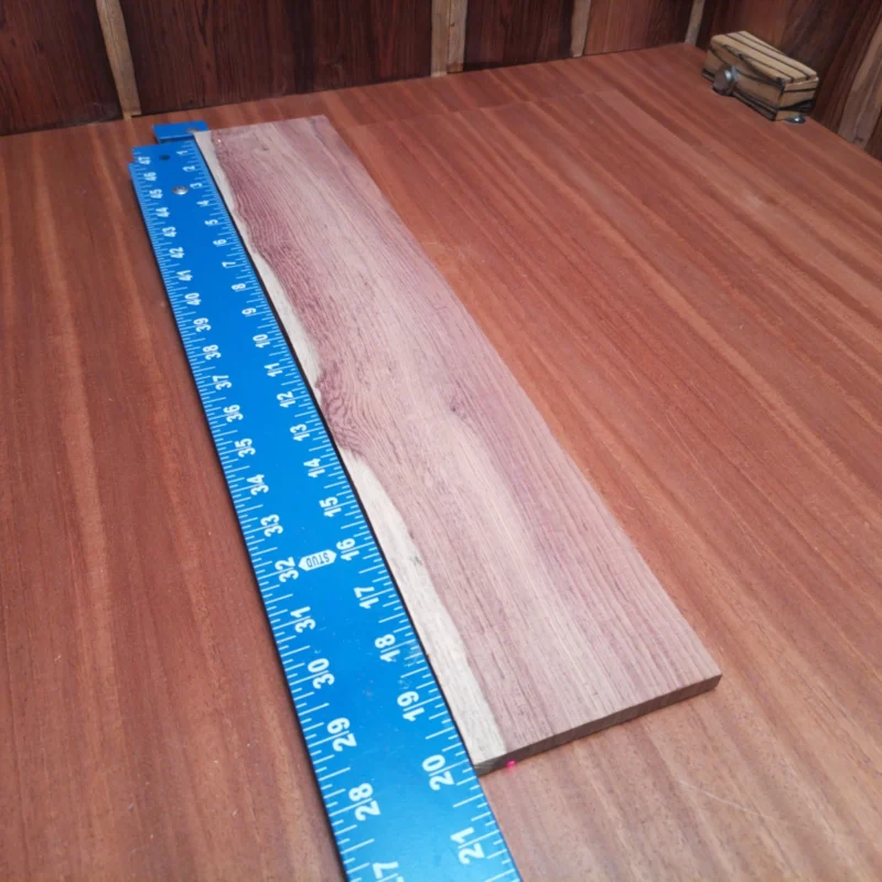 Elevate your instrument craftsmanship with this Honduran Rosewood fingerboards blank. Renowned for its rich tonal qualities and stunning visual appeal, this piece is perfect for luthiers seeking to create exceptional acoustic experiences. With its unique grain pattern, combining durability and aesthetic charm, this blank is ready to bring your next guitar or ukulele project to life. Get inspired and craft something beautiful today! It is a Honduran Rosewood Acoustic Rift Sawn fingerboard blank with dimensions of 20.1 x 3.9 x 0.3 inches.