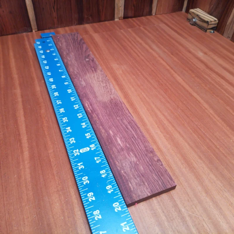 Explore the tonal possibilities with this Honduran Rosewood acoustic fingerboard blank. Perfect for luthiers, it offers a beautiful aesthetic matched with phenomenal sound projection. This rift sawn blank ensures stability and durability, making it an essential addition to your tonewood collection. Whether crafting a new acoustic masterpiece or enhancing an existing instrument, this fingerboard delivers rich resonance and clarity. It is a Honduran Rosewood Acoustic Rift Sawn fingerboard blank with dimensions of 20.0 x 2.8 x 0.3 inches.