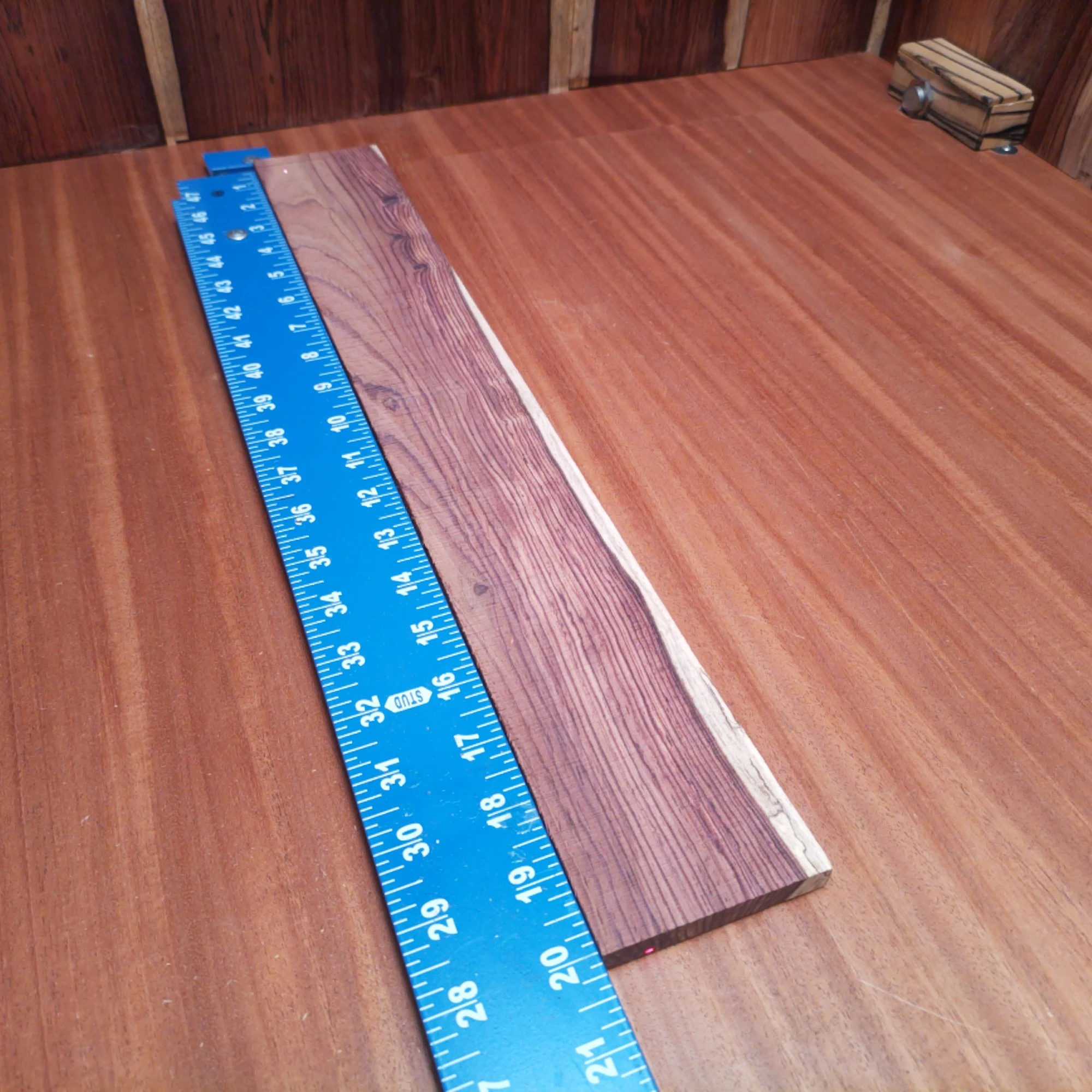 Honduran Rosewood Acoustic Rift Sawn Fingerboard Blank 0.4" X 2.8" X 20.0" - HRAFBR000152 2 Unleash your creativity with this premium Honduran Rosewood blank! Perfectly crafted for luthiers, it promises a robust tone and striking aesthetics. This fingerboard blank delivers excellent resonance and playability, ensuring a fantastic playing experience. Whether you’re crafting or customizing, this versatile wood is your perfect partner for stunning instruments that will stand out on any stage. It is a Honduran Rosewood Acoustic Rift Sawn fingerboard blank with dimensions of 20.0 x 2.8 x 0.4 inches.