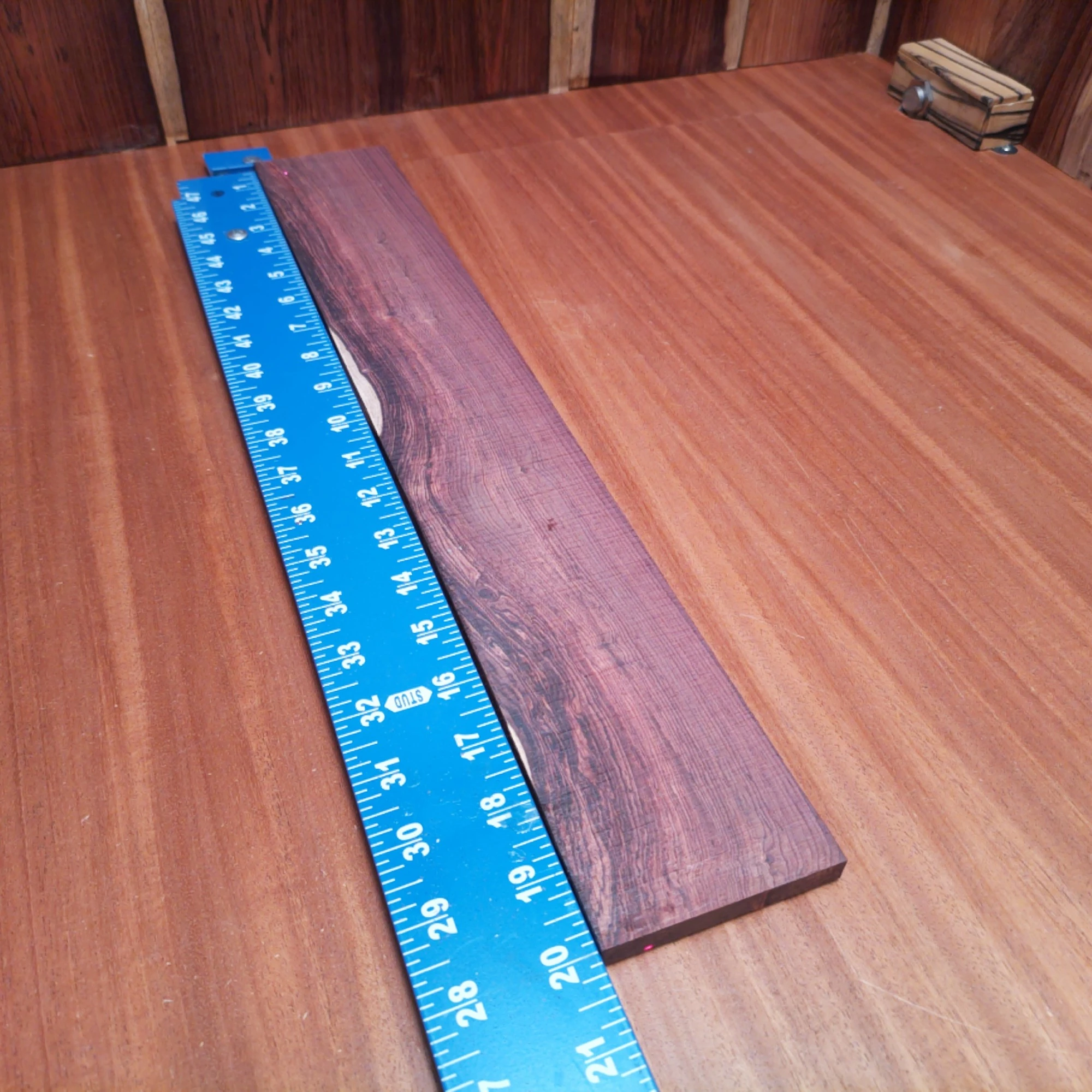 Honduran Rosewood Acoustic Rift Sawn Fingerboard Blank 0.4" X 3.0" X 20.0" - HRAFBR000153 2 Unleash your creativity with this premium Honduran Rosewood acoustic fingerboard blank. Its rich tonal quality and beautiful grain elevate your lutherie projects, making it the perfect choice for building exceptional instruments. Whether crafting a guitar or a ukulele, this blank combines durability with a stunning look, ensuring your instrument will stand out. Transform your musical vision into reality with this must-have fingerboard addition! It is a Honduran Rosewood Acoustic Rift Sawn fingerboard blank with dimensions of 20.0 x 3.0 x 0.4 inches.