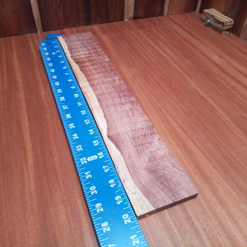 Elevate your instrument crafting with our premium Honduran Rosewood fingerboard blank. Known for its rich, warm tones and striking visual grain, this high-quality wood enhances both the aesthetic and acoustic properties of any guitar. Ideal for luthiers seeking beauty and durability, our blanks will help you create stunning instruments that resonate with character and style. Get ready to turn your next project into a masterpiece! It is a Honduran Rosewood Acoustic Rift Sawn fingerboard blank with dimensions of 20.0 x 3.4 x 0.4 inches.