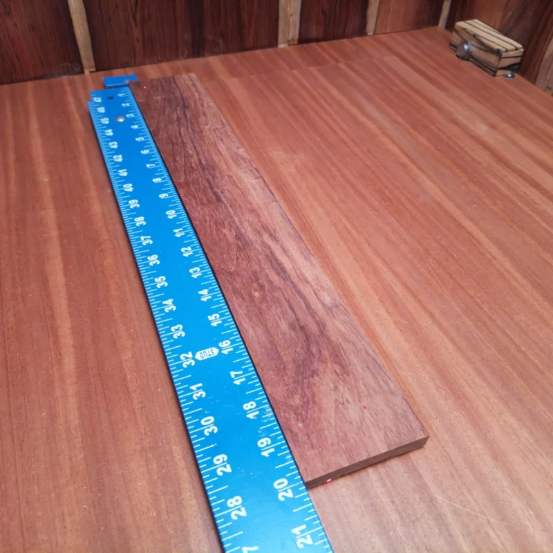 Unlock your creativity with this premium Honduran Rosewood blank, perfect for crafting stunning acoustic instruments. With its rift-sawn structure, this wood allows for unparalleled tonal clarity, making it a top choice for luthiers. Whether you're building a beautiful guitar or creating a unique string instrument, this blank provides the durability and aesthetic appeal you need. Experience the rich tones and beautiful grain of Honduran Rosewood today! It is a Honduran Rosewood Acoustic Rift Sawn fingerboard blank with dimensions of 20.0 x 3.1 x 0.4 inches.