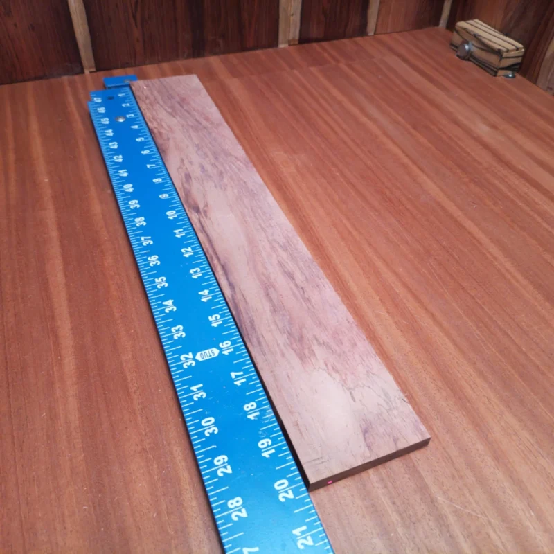 Unlock your creativity with this premium Honduran Rosewood blank, perfect for crafting stunning acoustic instruments. With its rift-sawn structure, this wood allows for unparalleled tonal clarity, making it a top choice for luthiers. Whether you're building a beautiful guitar or creating a unique string instrument, this blank provides the durability and aesthetic appeal you need. Experience the rich tones and beautiful grain of Honduran Rosewood today! It is a Honduran Rosewood Acoustic Rift Sawn fingerboard blank with dimensions of 20.0 x 3.1 x 0.4 inches.