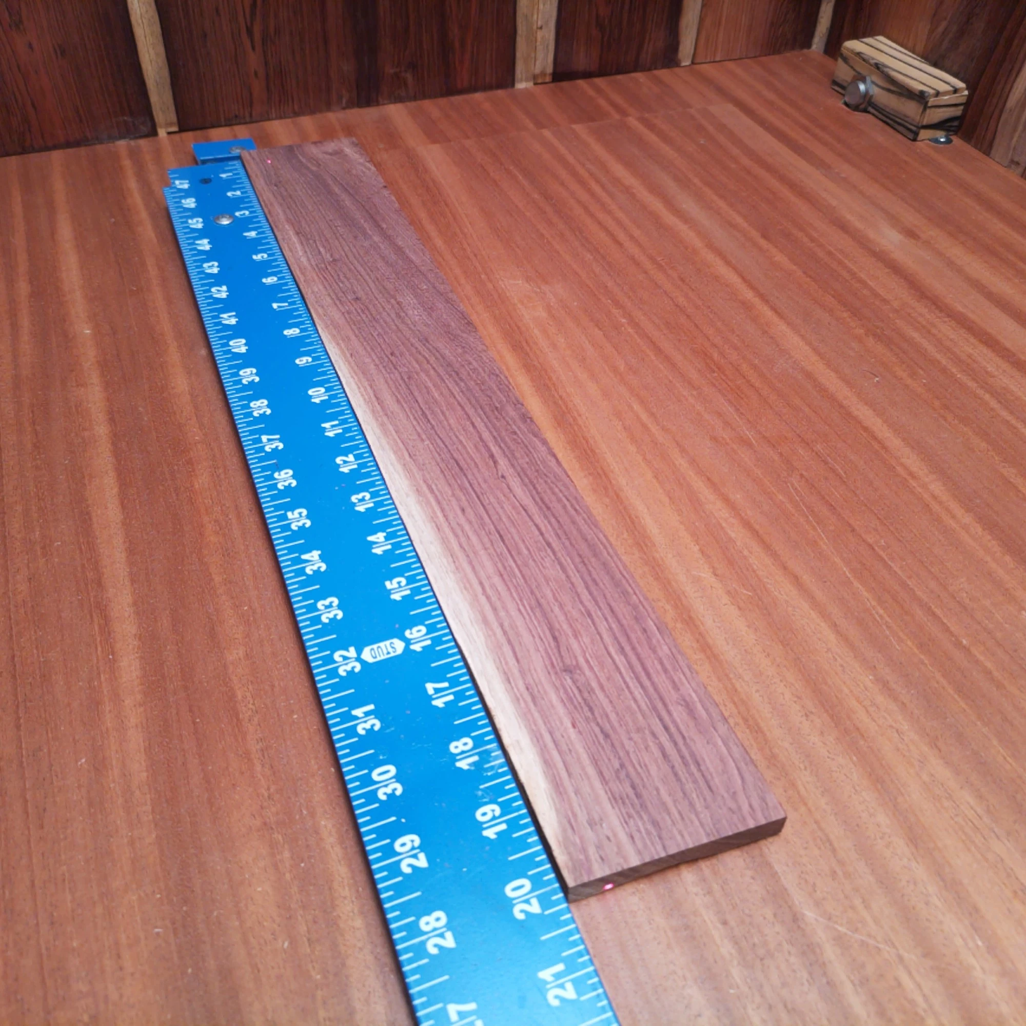 Honduran Rosewood Acoustic Rift Sawn Fingerboard Blank 0.4" X 2.9" X 20.1" - HRAFBR000162 1 Unlock your creativity with this rift sawn Honduran rosewood blank perfect for crafting stunning fingerboards. Renowned for its durability and tonal qualities, this 0.4" thick beauty offers a balance of warmth and brightness in sound. Ideal for luthiers seeking to enhance their projects, it’s a must-have for any workshop. Make your next acoustic instrument truly stand out with this unique material. It is a Honduran Rosewood Acoustic Rift Sawn fingerboard blank with dimensions of 20.1 x 2.9 x 0.4 inches.