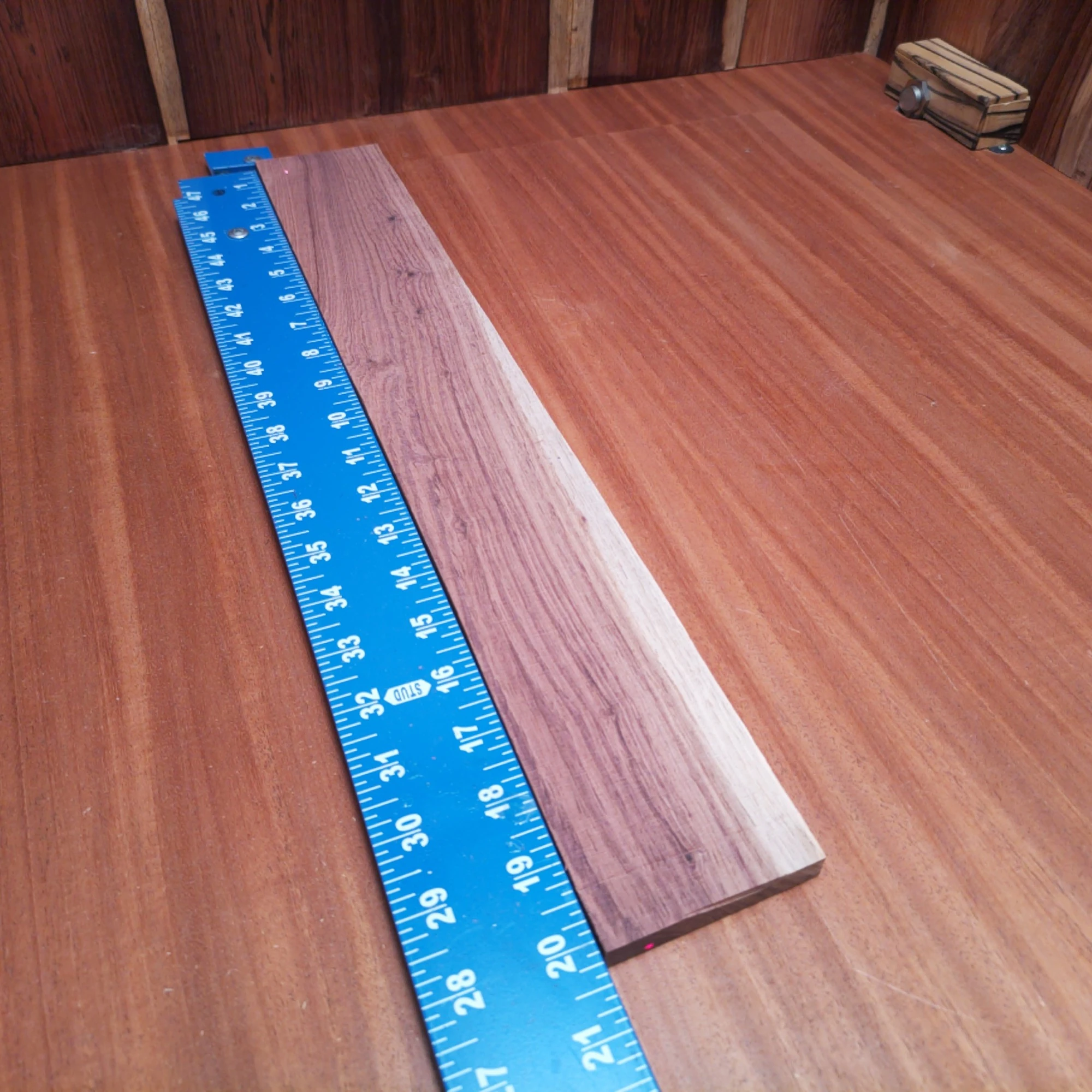 Honduran Rosewood Acoustic Rift Sawn Fingerboard Blank 0.4" X 2.9" X 20.1" - HRAFBR000162 2 Unlock your creativity with this rift sawn Honduran rosewood blank perfect for crafting stunning fingerboards. Renowned for its durability and tonal qualities, this 0.4" thick beauty offers a balance of warmth and brightness in sound. Ideal for luthiers seeking to enhance their projects, it’s a must-have for any workshop. Make your next acoustic instrument truly stand out with this unique material. It is a Honduran Rosewood Acoustic Rift Sawn fingerboard blank with dimensions of 20.1 x 2.9 x 0.4 inches.