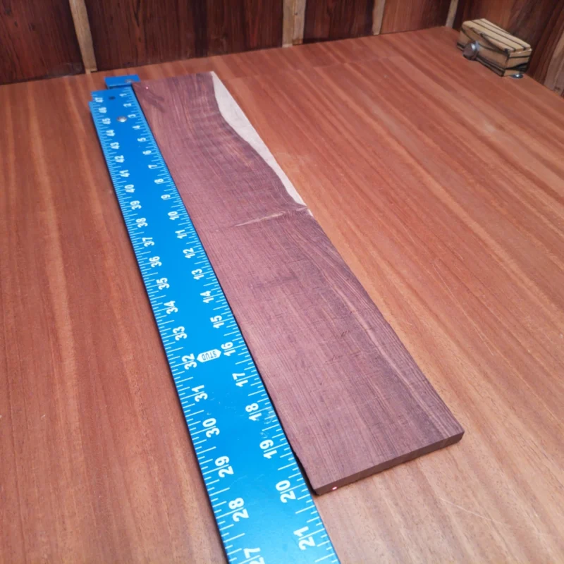 Crafted from premium Honduran Rosewood, this fingerboard blank promises unmatched durability and rich tonal quality. Perfectly rift sawn, it offers luthiers the ideal blend of beauty and functionality. With its luscious grain patterns and robust density, this blank is designed for serious instrument makers looking to elevate their craft. Say goodbye to mediocre, and bring your next project to life with this stunning piece. It is a Honduran Rosewood Acoustic Rift Sawn fingerboard blank with dimensions of 20.2 x 3.8 x 0.4 inches.