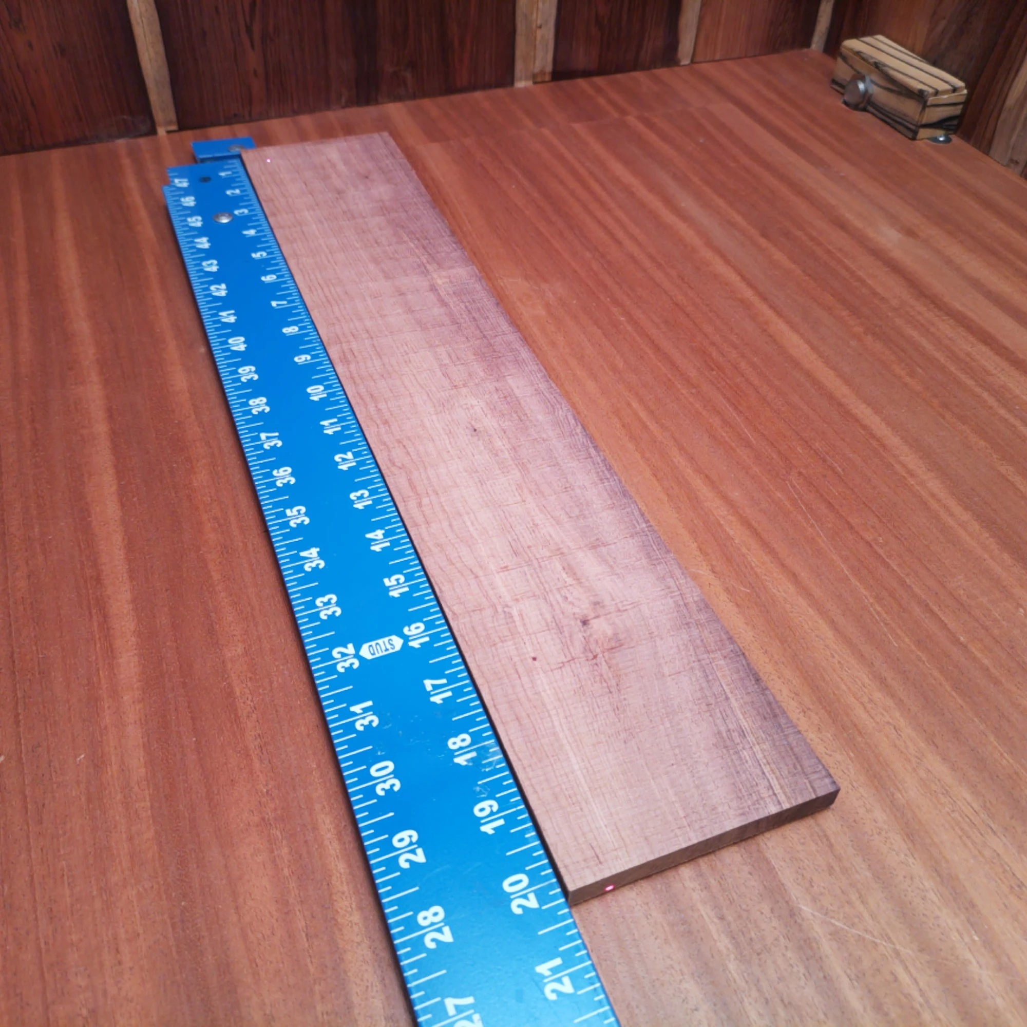 Honduran Rosewood Acoustic Rift Sawn Fingerboard Blank 0.4" X 3.7" X 20.2" - HRAFBR000178 2 Elevate your string instrument creations with this Honduran Rosewood blank. Known for its rich tonal qualities and stunning appearance, this rift sawn piece is perfect for luthiers seeking to craft exceptional acoustic guitars or high-end ukuleles. Its dense structure not only ensures durability but also enhances sound projection, making every note resonate beautifully. Unleash your creativity and bring your musical visions to life with this premium wood. It is a Honduran Rosewood Acoustic Rift Sawn fingerboard blank with dimensions of 20.2 x 3.7 x 0.4 inches.