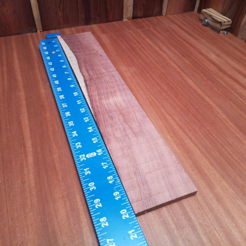 Crafted from premium Honduran Rosewood, this fingerboards blank ensures superior tonal quality and durability. Its rift sawn cut provides an elegant grain pattern that enhances the visual appeal of any instrument. Whether you're a seasoned luthier or a passionate hobbyist, this high-quality blank is perfect for creating custom fingerboards that stand out in sound and style. It is a Honduran Rosewood Acoustic Rift Sawn fingerboard blank with dimensions of 20.2 x 3.6 x 0.4 inches.