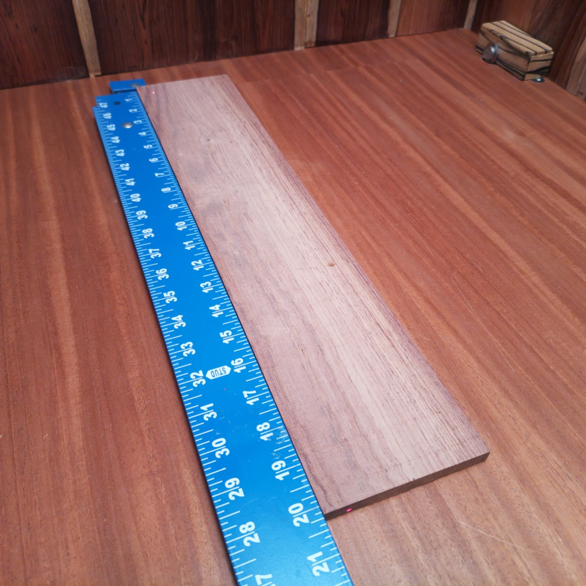 Honduran Rosewood Acoustic Rift Sawn Fingerboard Blank 0.3" X 4.0" X 20.1" - HRAFBR000184 2 Unlock the potential of your next build with this Honduran Rosewood fingerboard blank! Perfect for luthiers, this top-quality, rift sawn piece delivers excellent tonal qualities, unparalleled durability, and stunning aesthetics. Ideal for acoustic guitars, this blank promises to elevate your craftsmanship to new heights. Say goodbye to ordinary and embrace extraordinary with this must-have tonewood in your workshop! It is a Honduran Rosewood Acoustic Rift Sawn fingerboard blank with dimensions of 20.1 x 4.0 x 0.3 inches.