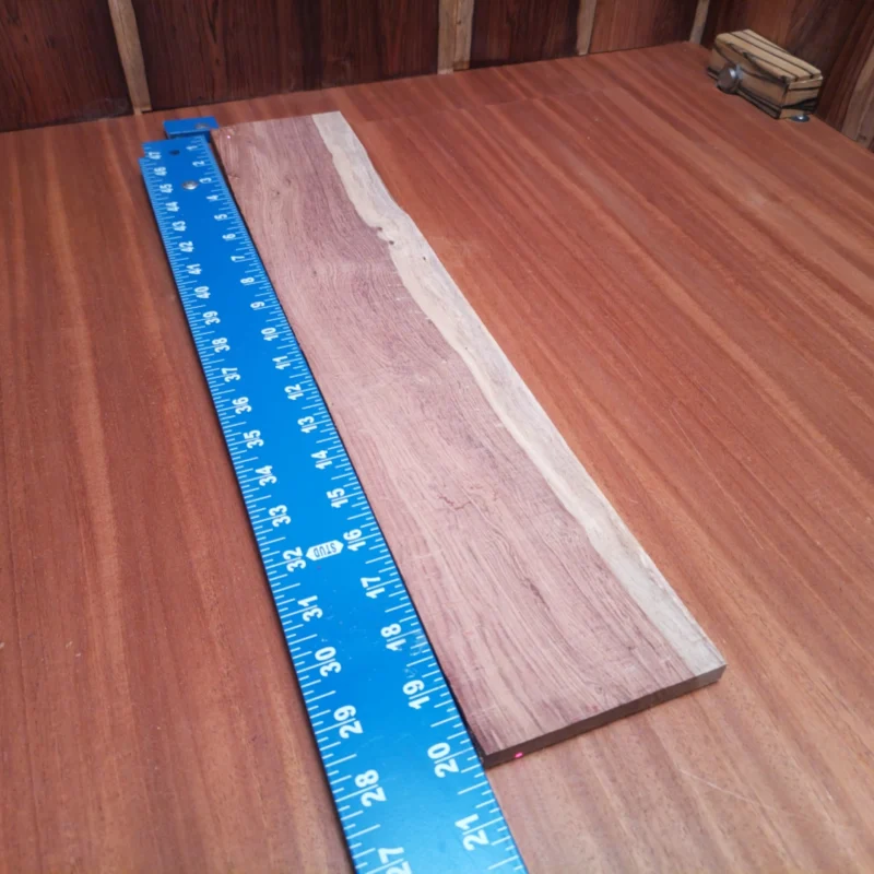 Elevate your craftsmanship with this Honduran Rosewood blank, ideal for luthiers seeking quality. Known for its vibrant tones and stunning grain patterns, it enhances the sound of any acoustic instrument. The stable and durable nature of the wood ensures a long-lasting performance, making it a smart choice for your next build. Embrace both artistry and functionality with this beautiful fingerboards blank, sure to captivate musicians and makers alike! It is a Honduran Rosewood Acoustic Rift Sawn fingerboard blank with dimensions of 20.2 x 3.9 x 0.4 inches.