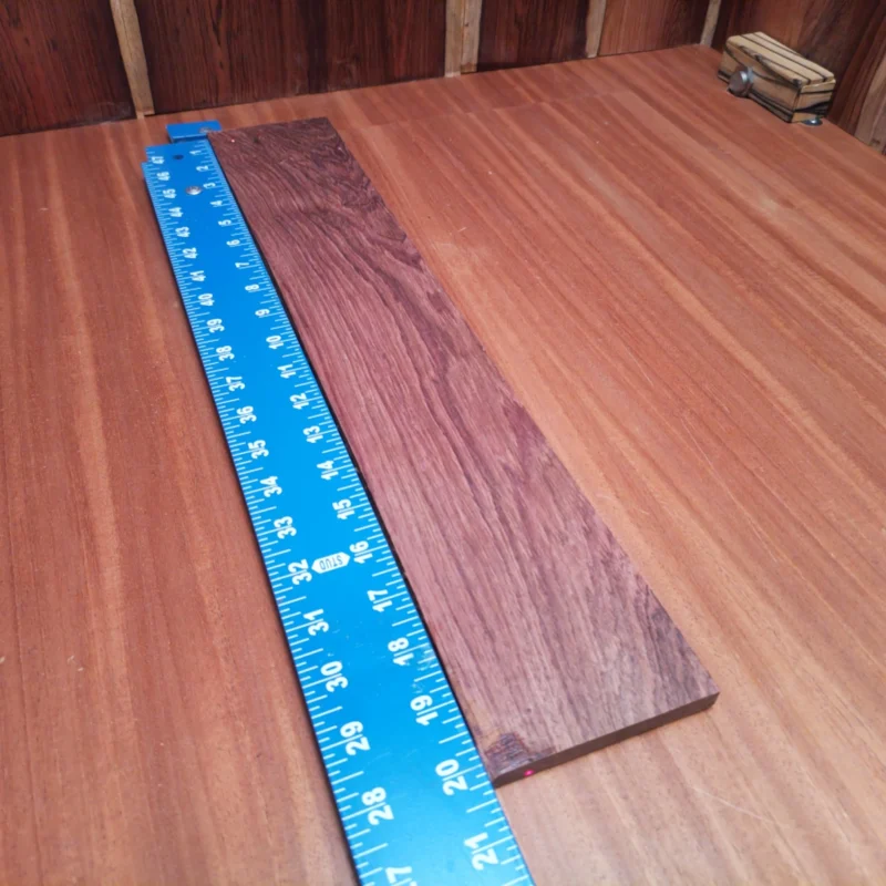 Crafted from genuine Honduran Rosewood, this fingerboards blank offers rich tonal qualities and stunning aesthetics. Its rift-sawn design delivers consistent grain and durability for luthiers looking to create hand-crafted acoustic masterpieces. This material not only looks great but also enhances playability, making it ideal for innovative guitar builds. Perfect for both novice and seasoned builders, this fingerboard blank promises to inspire your next musical creation! It is a Honduran Rosewood Acoustic Rift Sawn fingerboard blank with dimensions of 20.2 x 3.6 x 0.4 inches.