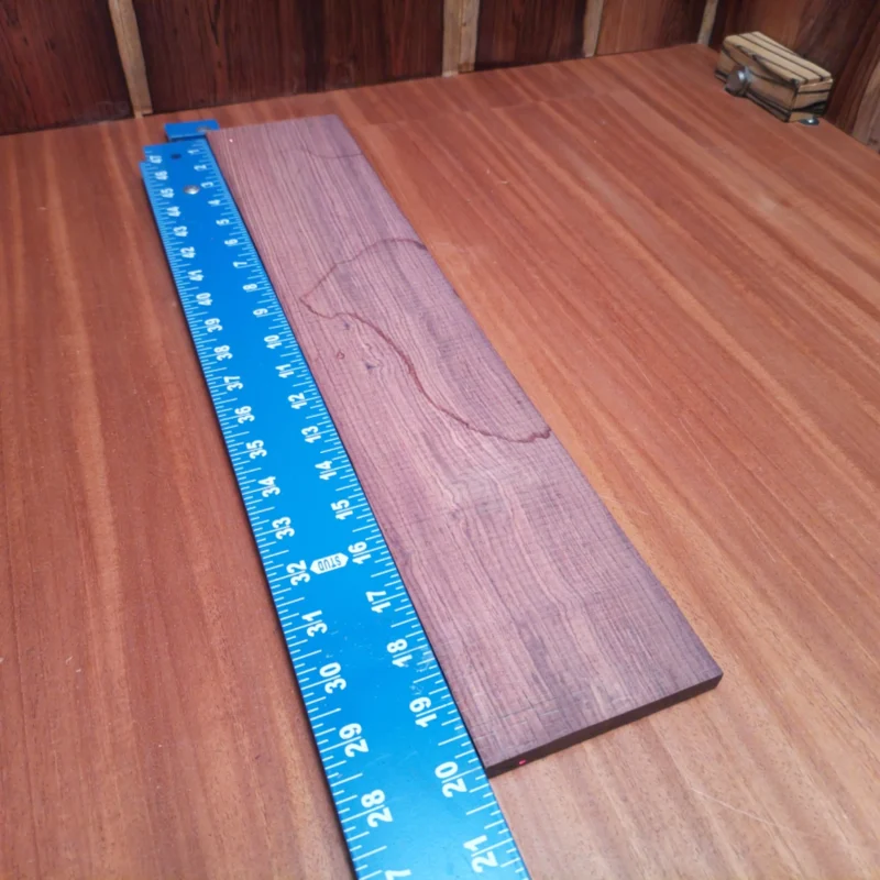 Unlock your creativity with this Honduran Rosewood acoustic blank! Perfect for luthiers seeking rich tones and stunning aesthetics. Its rift sawn cut ensures durability and stability, making it a reliable choice for your next project. With a warm, deep sound and unique grain patterns, this fingerboard blank will elevate your instruments to the next level of craftsmanship. It is a Honduran Rosewood Acoustic Rift Sawn fingerboard blank with dimensions of 20.1 x 3.9 x 0.4 inches.