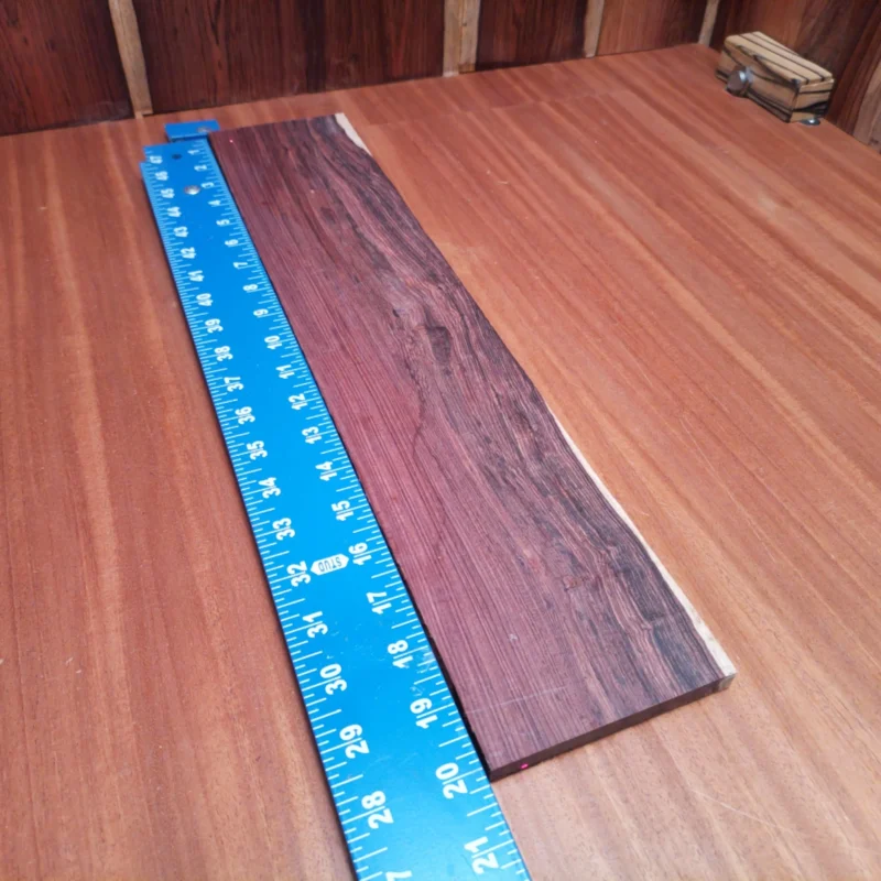 Elevate your luthier skills with this Honduran Rosewood acoustic blank. Known for its stunning grain and rich tonal characteristics, this blank is a top choice for high-quality instruments. Perfectly rift sawn, it ensures stability and beauty in every project, promising incredible sound quality that will have musicians coming back for more. Whether you're crafting your next masterpiece or experimenting with new designs, this rosewood blank will deliver excellence. It is a Honduran Rosewood Acoustic Rift Sawn fingerboard blank with dimensions of 20.0 x 4.0 x 0.4 inches.