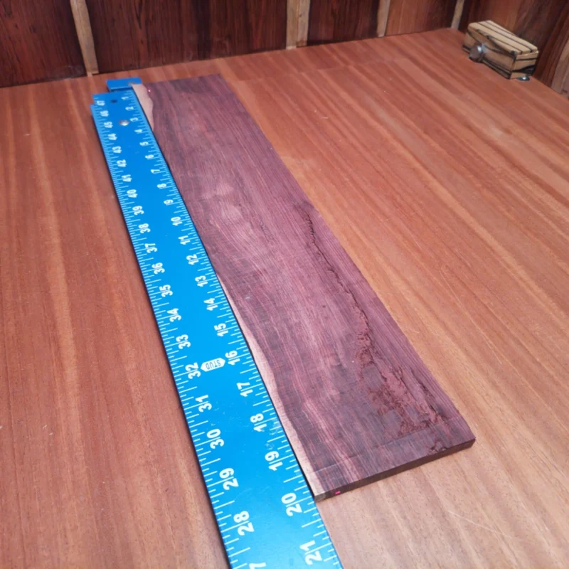 Elevate your luthier skills with this Honduran Rosewood acoustic blank. Known for its stunning grain and rich tonal characteristics, this blank is a top choice for high-quality instruments. Perfectly rift sawn, it ensures stability and beauty in every project, promising incredible sound quality that will have musicians coming back for more. Whether you're crafting your next masterpiece or experimenting with new designs, this rosewood blank will deliver excellence. It is a Honduran Rosewood Acoustic Rift Sawn fingerboard blank with dimensions of 20.0 x 4.0 x 0.4 inches.