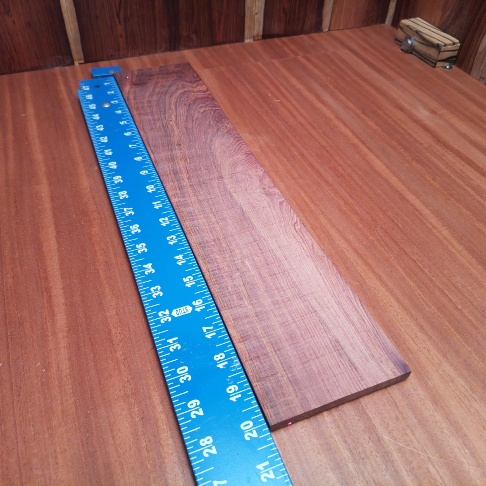 Honduran Rosewood Acoustic Rift Sawn Fingerboard Blank 0.3" X 4.0" X 20.1" - HRAFBR000199 1 Elevate your craftsmanship with this Honduran Rosewood fingerboards blank. Perfect for luthiers looking for premium quality, its rich, warm tones enhance sound clarity and resonance. Boasting a striking grain pattern, this blank isn't just a practical choice; it also adds visual appeal to your instruments. Ideal for creating top-notch acoustic guitars, your creations will resonate with unmatched beauty and depth. It is a Honduran Rosewood Acoustic Rift Sawn fingerboard blank with dimensions of 20.1 x 4.0 x 0.3 inches.