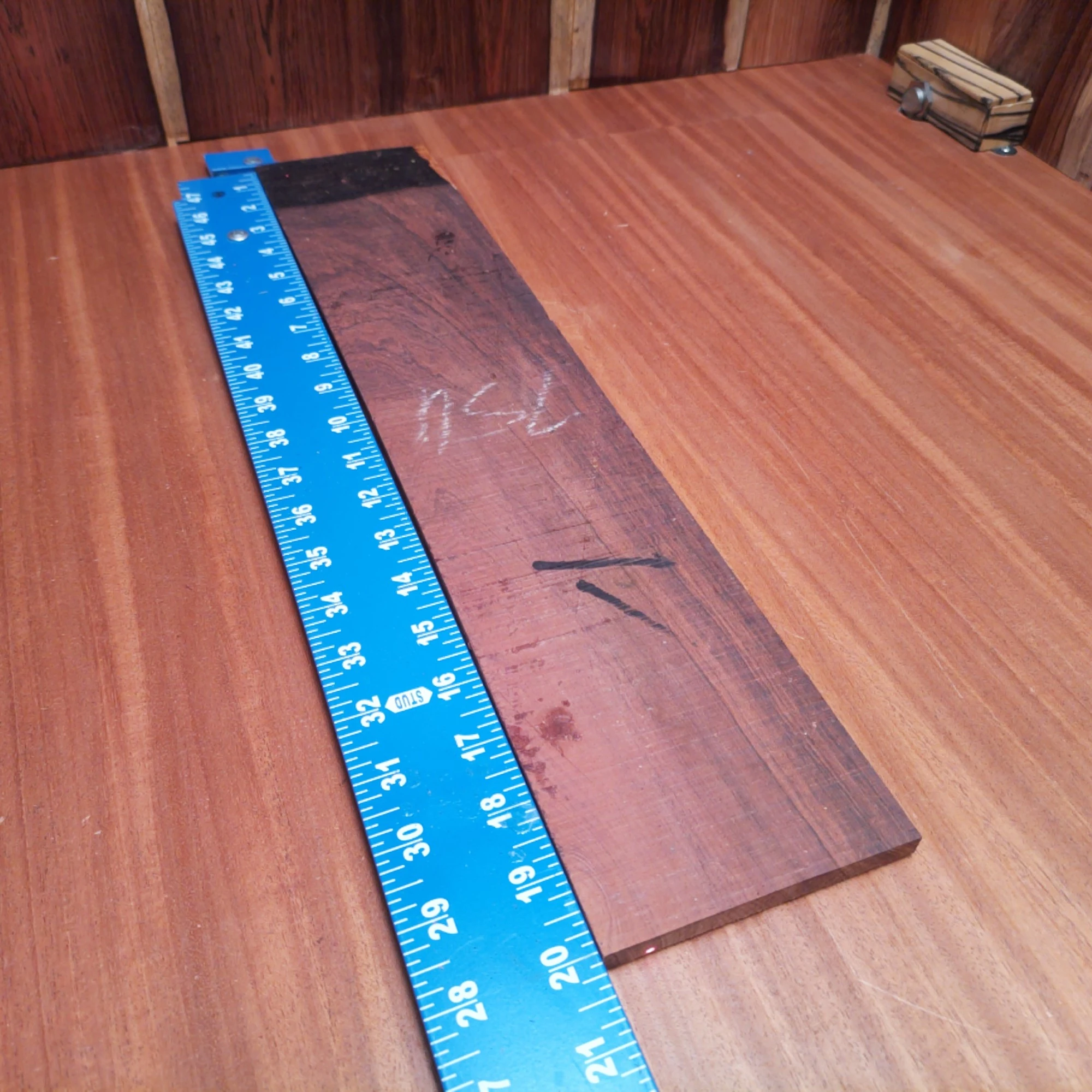 Honduran Rosewood Acoustic Rift Sawn Fingerboard Blank 0.3" X 4.0" X 20.1" - HRAFBR000199 2 Elevate your craftsmanship with this Honduran Rosewood fingerboards blank. Perfect for luthiers looking for premium quality, its rich, warm tones enhance sound clarity and resonance. Boasting a striking grain pattern, this blank isn't just a practical choice; it also adds visual appeal to your instruments. Ideal for creating top-notch acoustic guitars, your creations will resonate with unmatched beauty and depth. It is a Honduran Rosewood Acoustic Rift Sawn fingerboard blank with dimensions of 20.1 x 4.0 x 0.3 inches.