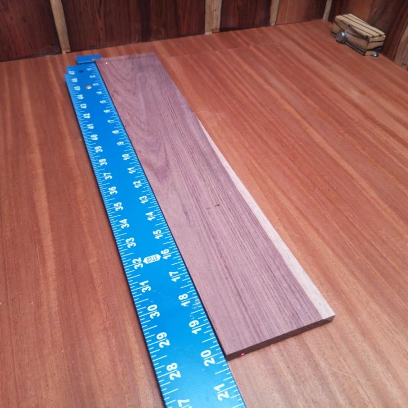 Elevate your luthier skills with this Honduran Rosewood blank, perfect for crafting stunning acoustic instruments. Its rich grain and vibrant tone make it a favorite among builders, while the unique rift sawn cuts offer unmatched stability. Whether you're designing a custom guitar or a beautiful ukulele, this incredible wood is your go-to for quality and performance in every strum! It is a Honduran Rosewood Acoustic Rift Sawn fingerboard blank with dimensions of 20.1 x 3.7 x 0.4 inches.