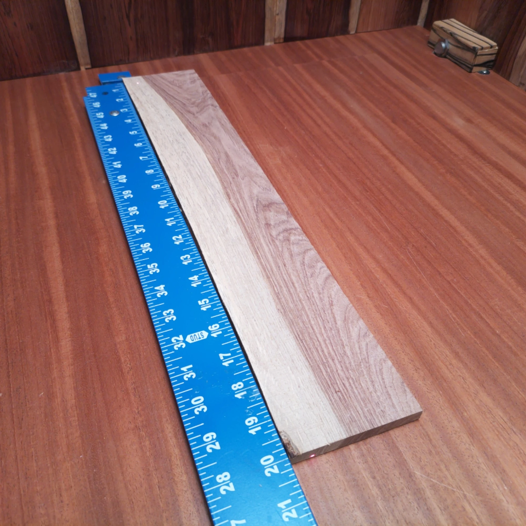 Honduran Rosewood Acoustic Rift Sawn Fingerboard Blank 0.4" X 3.5" X 20.0" - HRAFBR000203 2 Elevate your craftsmanship with this Honduran Rosewood blank, ideal for creating stunning acoustic instruments. With its beautiful grain and natural tonal qualities, this rift sawn wood will enhance sound projection and resonance. Luthiers will appreciate its durability and elegance, making it the perfect choice for high-quality guitar builds or other stringed instruments. Transform your musical vision into reality with this premium wood. It is a Honduran Rosewood Acoustic Rift Sawn fingerboard blank with dimensions of 20.0 x 3.5 x 0.4 inches.