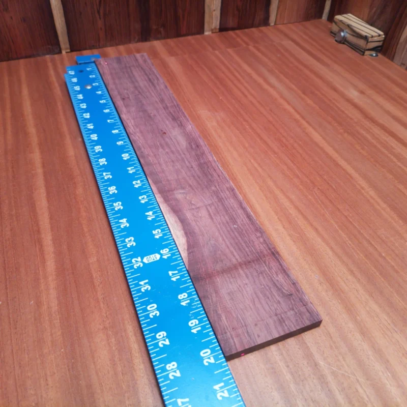 Unlock your creative potential with this stunning Honduran Rosewood blank, perfect for crafting beautifully resonant acoustic instruments. Known for its rich tonal qualities and striking look, this rift-sawn fingerboard blank offers a solid foundation for luthiers seeking to create standout guitars. Elevate your craftsmanship with premium materials that deliver sound quality and visual appeal, ensuring every strum resonates with excellence. It is a Honduran Rosewood Acoustic Rift Sawn fingerboard blank with dimensions of 20.1 x 3.3 x 0.4 inches.