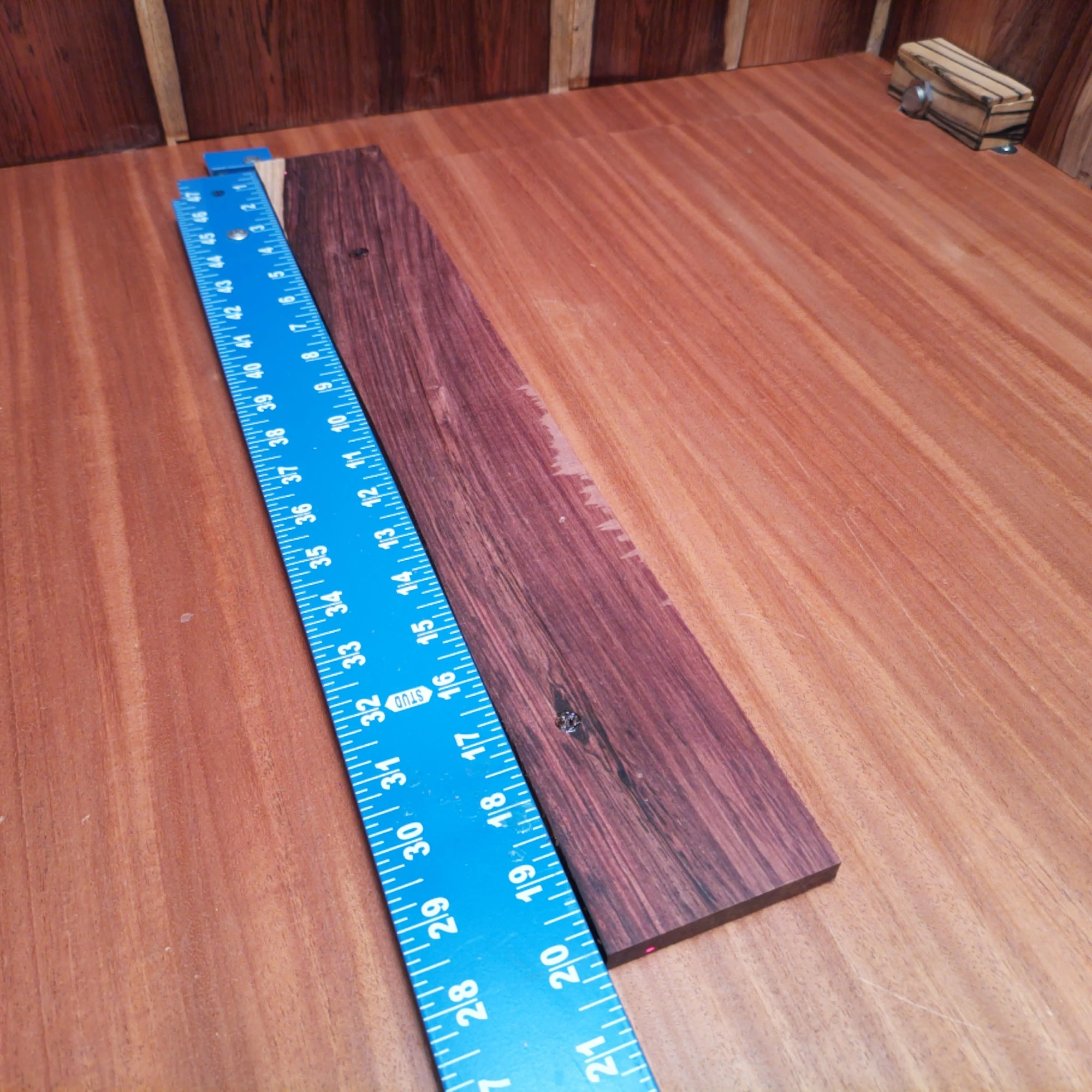 Honduran Rosewood Acoustic Rift Sawn Fingerboard Blank 0.4" X 2.9" X 20.0" - HRAFBR000214 1 Crafted from beautiful Honduran rosewood, this fingerboards blank offers rich tonal quality and stunning visuals. Its rift sawn design ensures durability and stability for luthiers seeking to build exceptional acoustic instruments. Perfect for your next project, it promises a vibrant sound that musicians will love, combined with an elegant finish that speaks to both traditional and modern aesthetics. It is a Honduran Rosewood Acoustic Rift Sawn fingerboard blank with dimensions of 20.0 x 2.9 x 0.4 inches.