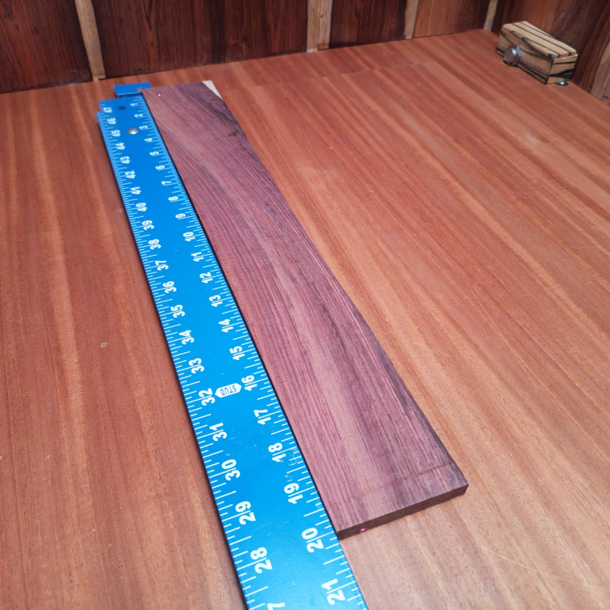 Honduran Rosewood Acoustic Rift Sawn Fingerboard Blank 0.4" X 2.9" X 20.0" - HRAFBR000214 2 Crafted from beautiful Honduran rosewood, this fingerboards blank offers rich tonal quality and stunning visuals. Its rift sawn design ensures durability and stability for luthiers seeking to build exceptional acoustic instruments. Perfect for your next project, it promises a vibrant sound that musicians will love, combined with an elegant finish that speaks to both traditional and modern aesthetics. It is a Honduran Rosewood Acoustic Rift Sawn fingerboard blank with dimensions of 20.0 x 2.9 x 0.4 inches.
