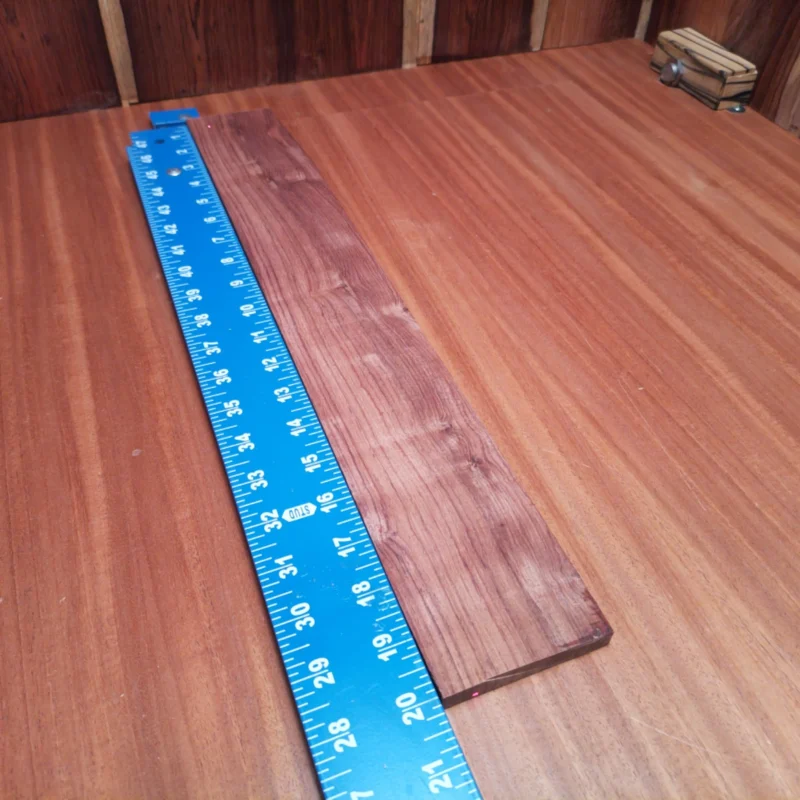 Fingerboard Blanks 96 Elevate your acoustic builds with this Honduran Rosewood fingerboard blank. Known for its stunning grain and rich tonal qualities, this premium wood offers both beauty and durability. Perfectly sawn for effortless handling, it brings out the best in your string instruments. Get ready to enhance playability while adding a touch of elegance to your creations! It is a Honduran Rosewood Acoustic Rift Sawn fingerboard blank with dimensions of 20.0 x 2.7 x 0.4 inches.