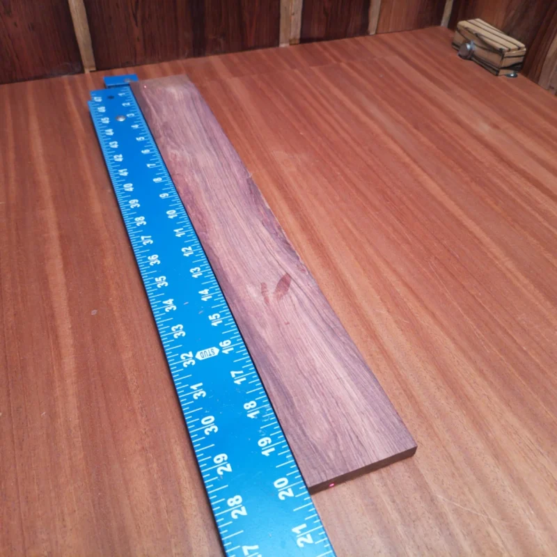 Fingerboard Blanks 100 Crafted from stunning Honduran rosewood, this fingerboard blank is perfect for luthiers seeking top-notch quality. At 0.4 inches thick, 2.7 inches wide, and 20.1 inches long, it offers ample space for creating beautiful fretboards. The rich tonal qualities and striking grain patterns make it a desirable choice for enhancing any acoustic instrument. Perfect for both seasoned pros and new builders looking to elevate their craftsmanship. It is a Honduran Rosewood Acoustic Rift Sawn fingerboard blank with dimensions of 20.1 x 2.7 x 0.4 inches.