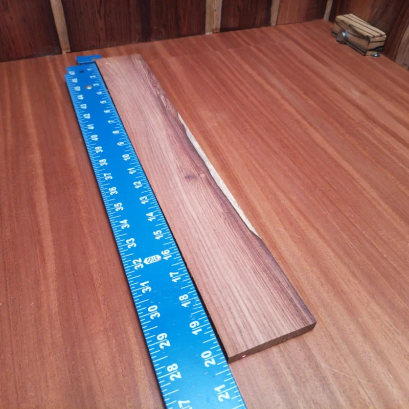 Fingerboard Blanks 154 Elevate your luthiery with this premium Honduran Rosewood blank. Crafted for acoustic instruments, its dense grain ensures rich sound and durability. This versatile wood is perfect for backs, sides, and more, bringing both beauty and unmatched performance to your creations. Whether you’re a seasoned pro or a home hobbyist, your next masterpiece awaits. It is a Honduran Rosewood Acoustic Rift Sawn fingerboard blank with dimensions of 20.1 x 2.8 x 0.4 inches.