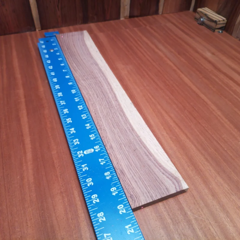 Elevate your crafting game with this Honduran Rosewood acoustic fingerboard blank! Known for its rich tonal characteristics, this premium wood gives your instrument a warm, rounded sound. With its stunning grain and durability, it’s perfect for luthiers looking to enhance playability and aesthetic appeal. Transform your guitar projects with this versatile blank, designed for both seasoned pros and enthusiastic hobbyists alike! It is a Honduran Rosewood Acoustic Rift Sawn fingerboard blank with dimensions of 20.2 x 3.2 x 0.4 inches.