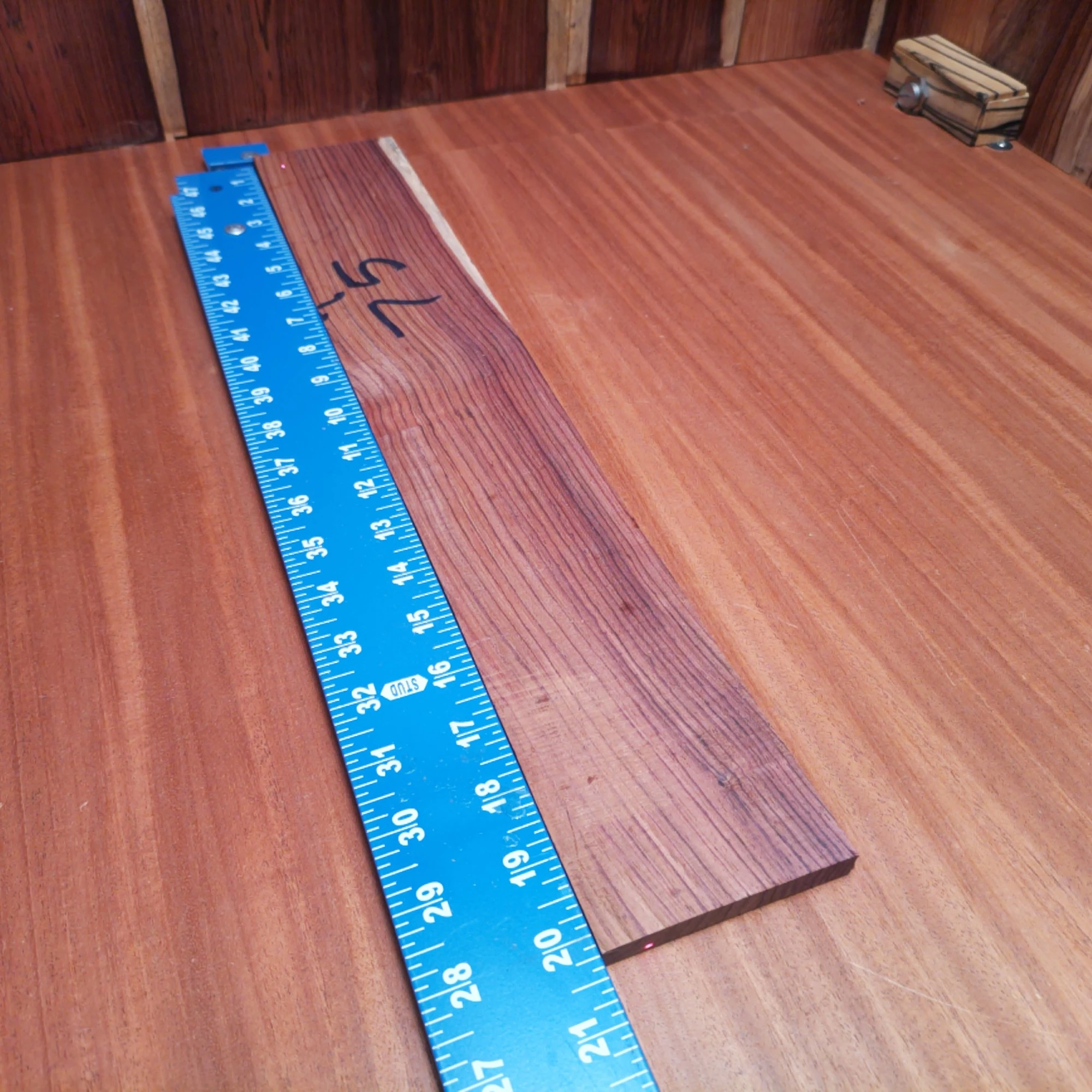 Honduran Rosewood Acoustic Rift Sawn Fingerboard Blank 0.4" X 3.3" X 20.2" - HRAFBR000243 1 Crafted from premium Honduran Rosewood, this fingerboards blank delivers unmatched warmth and rich tones. Perfect for luthiers looking to create exceptional instruments, its rift-sawn grain provides stunning aesthetic appeal along with phenomenal playability. Get ready to elevate your builds with this high-quality wood that musicians will love. Whether you’re crafting acoustic or electric guitars, this blank offers precision and character on every fretboard. It is a Honduran Rosewood Acoustic Rift Sawn fingerboard blank with dimensions of 20.2 x 3.3 x 0.4 inches.