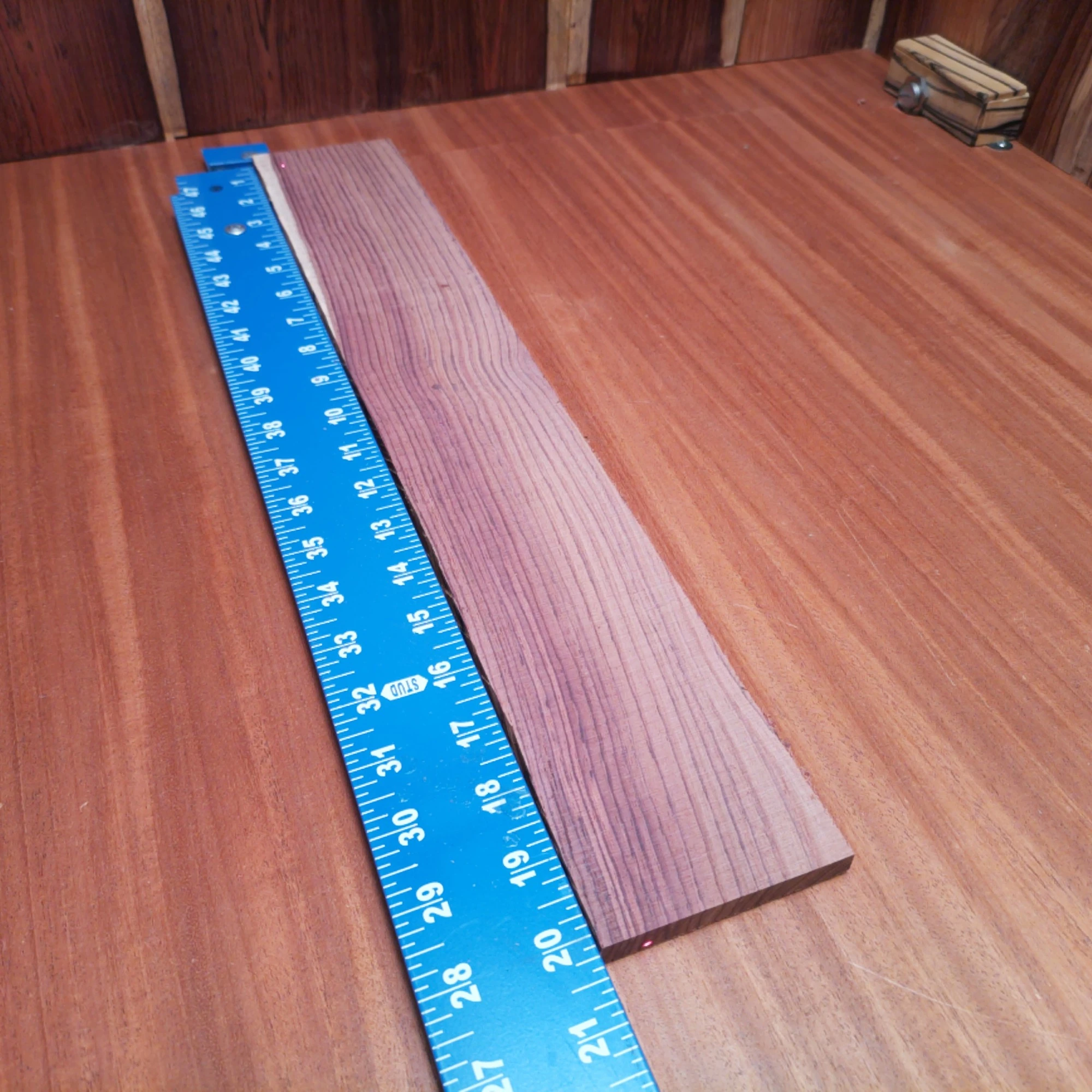 Honduran Rosewood Acoustic Rift Sawn Fingerboard Blank 0.4" X 3.3" X 20.2" - HRAFBR000243 2 Crafted from premium Honduran Rosewood, this fingerboards blank delivers unmatched warmth and rich tones. Perfect for luthiers looking to create exceptional instruments, its rift-sawn grain provides stunning aesthetic appeal along with phenomenal playability. Get ready to elevate your builds with this high-quality wood that musicians will love. Whether you’re crafting acoustic or electric guitars, this blank offers precision and character on every fretboard. It is a Honduran Rosewood Acoustic Rift Sawn fingerboard blank with dimensions of 20.2 x 3.3 x 0.4 inches.