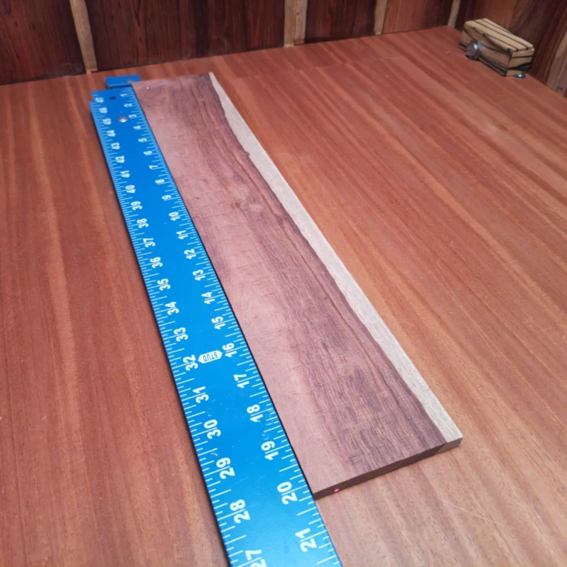 Crafted from premium Honduran Rosewood, this fingerboard blank is ideal for luthiers seeking durability and stunning aesthetic appeal. Its rift-sawn design ensures better stability and resonance, making your instruments sing. Perfect for crafting superior acoustic guitars or custom projects, this blank is a must-have for professional and hobbyist luthiers alike. Elevate your guitar-making game with rich tones and a striking finish that only Honduran Rosewood can provide. It is a Honduran Rosewood Acoustic Rift Sawn fingerboard blank with dimensions of 20.2 x 3.7 x 0.3 inches.