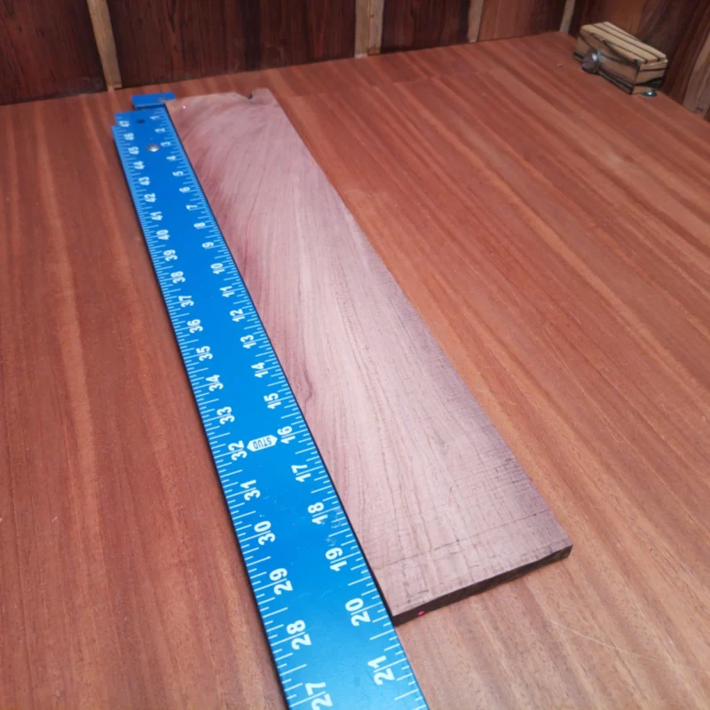 Crafted from premium Honduran Rosewood, this blank is ideal for luthiers looking to create stunning acoustic instruments. Its rift-sawn cut enhances tonal quality and ensures superior resonance while providing a beautiful aesthetic finish. Whether you're crafting a guitar, ukulele, or other string instruments, this fingerboard blank offers durability and rich tonal characteristics that musicians will love. Get ready to elevate your craft with this top-notch material! It is a Honduran Rosewood Acoustic Rift Sawn fingerboard blank with dimensions of 20.3 x 3.5 x 0.4 inches.