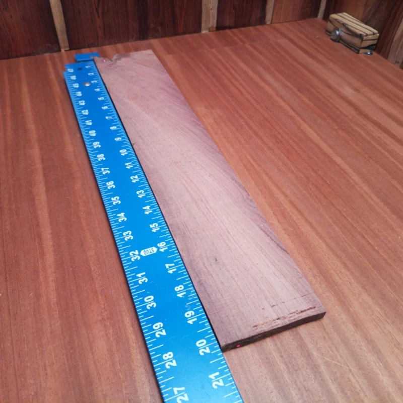Crafted from premium Honduran Rosewood, this blank is ideal for luthiers looking to create stunning acoustic instruments. Its rift-sawn cut enhances tonal quality and ensures superior resonance while providing a beautiful aesthetic finish. Whether you're crafting a guitar, ukulele, or other string instruments, this fingerboard blank offers durability and rich tonal characteristics that musicians will love. Get ready to elevate your craft with this top-notch material! It is a Honduran Rosewood Acoustic Rift Sawn fingerboard blank with dimensions of 20.3 x 3.5 x 0.4 inches.