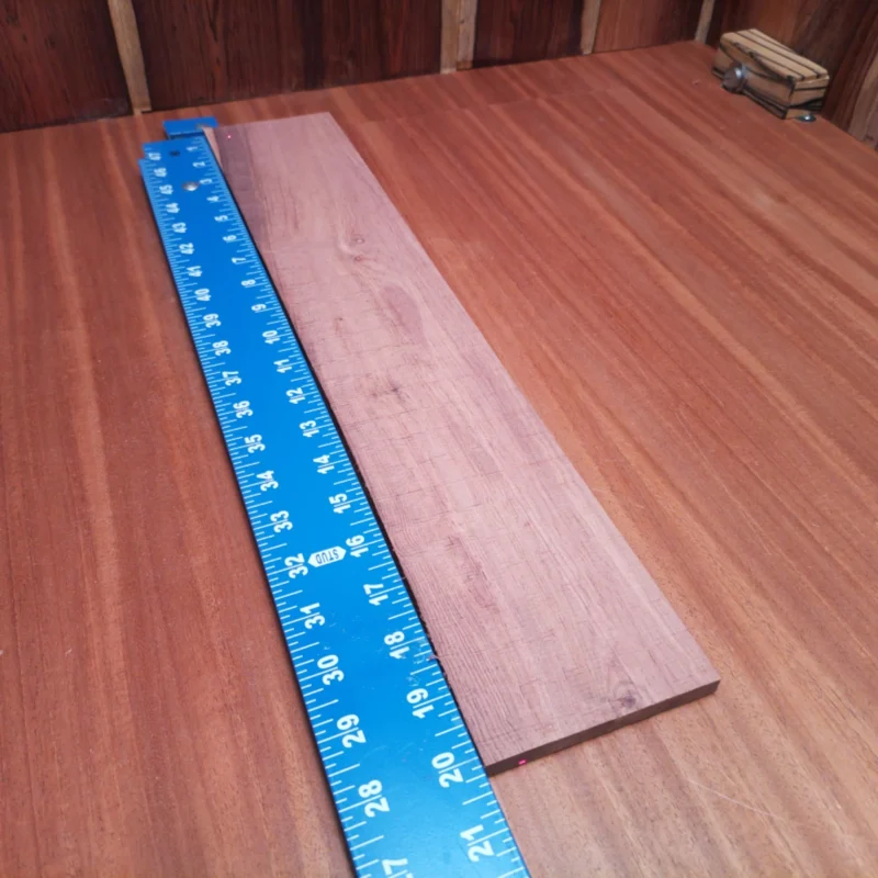Fingerboard Blanks 59 Transform your acoustic builds with this Honduran Rosewood blank, specially rift sawn for optimal tonal richness. Perfect for luthiers seeking durability and beauty, this piece offers unmatched resonance and warmth. Elevate your craftsmanship and delight your clients with stunning guitar backs, sides, or other custom projects. Unlock the full potential of your string instruments with this elegant and robust wood! It is a Honduran Rosewood Acoustic Rift Sawn fingerboard blank with dimensions of 20.1 x 3.7 x 0.3 inches.