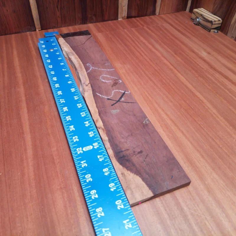 Embrace the craftsmanship of lutherie with this premium Honduran rosewood blank. Perfect for acoustic instruments, it boasts a stunning grain pattern and remarkable tonal qualities. Whether you’re creating a new guitar or restoring an old one, this rift sawn piece offers durability and vibrancy. Shape your sound with this go-to choice for luthiers seeking the very best. Elevate your artistry with this versatile, high-quality blank that is built for innovation. It is a Honduran Rosewood Acoustic Rift Sawn fingerboard blank with dimensions of 20.2 x 3.7 x 0.3 inches.