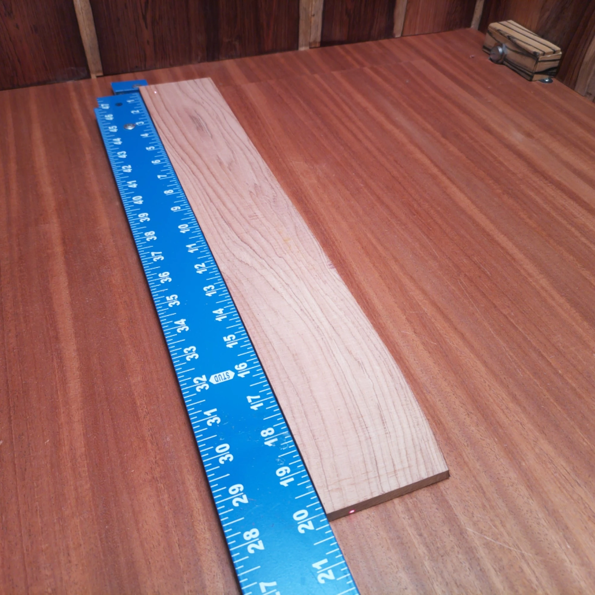 Honduran Rosewood Acoustic Rift Sawn Fingerboard Blank 0.4" X 3.1" X 20.1" - HRAFBR000262 2 Crafted from premium Honduran rosewood, this fingerboards blank delivers exceptional tonal quality and durability. Perfect for luthiers seeking the ideal foundation for acoustic instruments, its rift-sawn cut ensures superior stability and aesthetics. Whether you’re building a guitar or refreshing an existing model, this versatile blank brings a touch of classic elegance to your creations while enhancing sound resonance and playability. Elevate your craftsmanship with this carefully selected material that feels as good as it looks! It is a Honduran Rosewood Acoustic Rift Sawn fingerboard blank with dimensions of 20.1 x 3.1 x 0.4 inches.