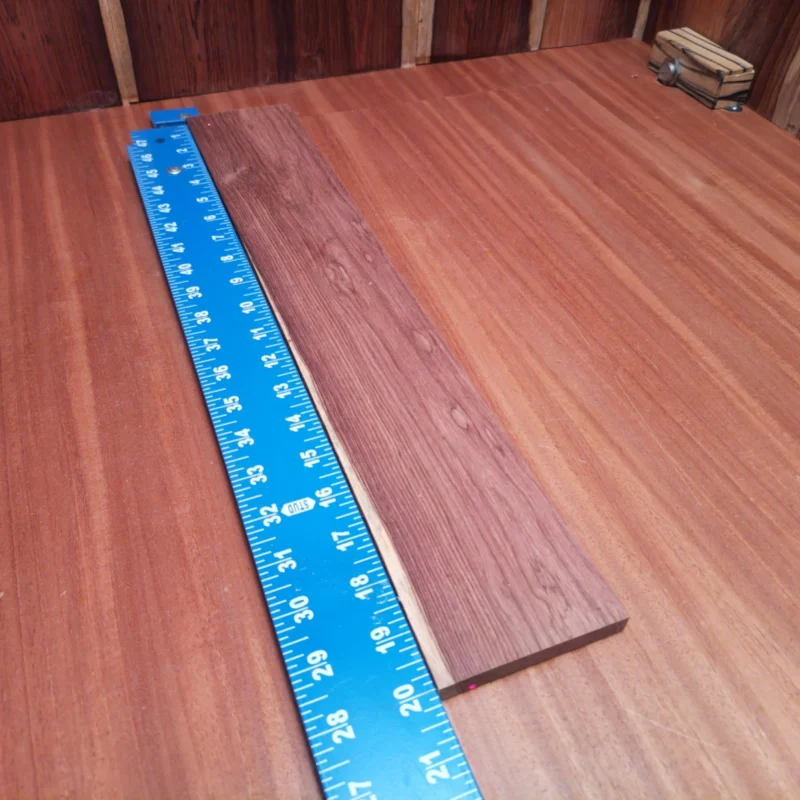 Crafted from premium Honduran Rosewood, this fingerboard blank showcases rich tonal qualities and stunning aesthetics. Perfect for luthiers seeking reliable performance, it measures 0.4" X 3.3" X 20.1". The rift-sawn cut enhances stability and ensures a consistent grain, making it a superb choice for your next acoustic masterpiece. Enhance your instrument's voice while enjoying the beauty of one of nature's finest woods, designed to last and inspire. Perfect for serious craftsmanship! It is a Honduran Rosewood Acoustic Rift Sawn fingerboard blank with dimensions of 20.1 x 3.3 x 0.4 inches.