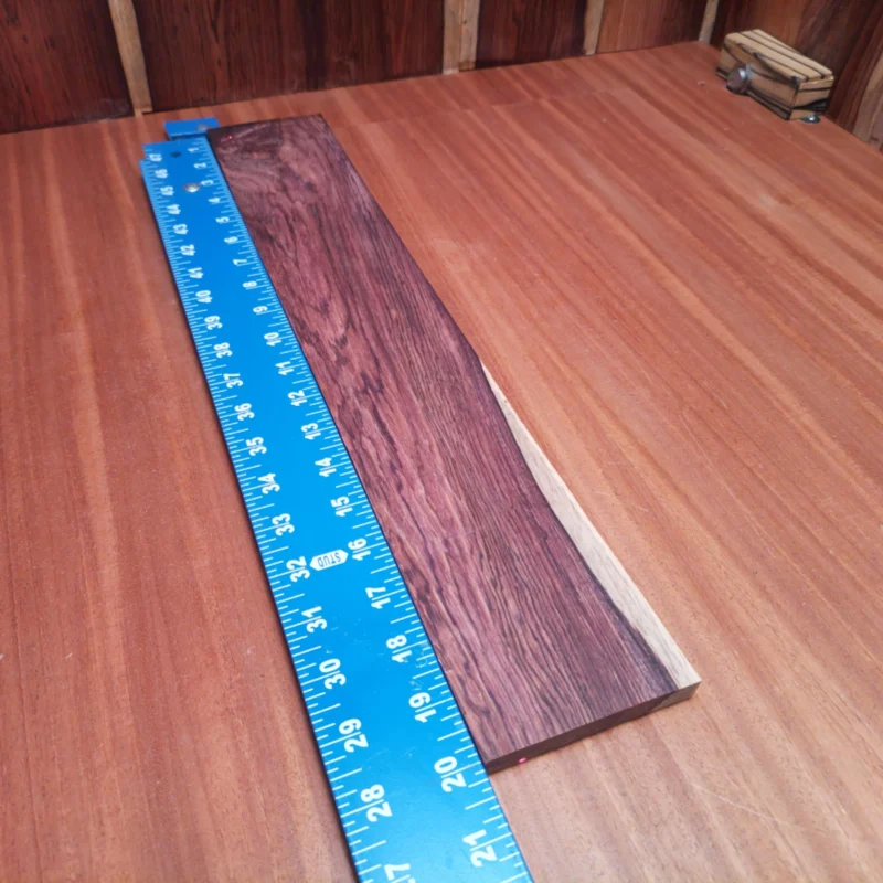 Enhance your guitar-building journey with our premium Honduran Rosewood blank. Perfectly rift sawn, this sturdy piece provides rich tonal qualities that enhance sound projection and resonance. Tailored for luthiers who prioritize quality in their instrument projects, it promises durability and beauty in every strum. Whether crafting acoustic masterpieces or unique custom designs, this fingerboard blank is your ideal companion for achieving perfect playability and tone. It is a Honduran Rosewood Acoustic Rift Sawn fingerboard blank with dimensions of 20.1 x 3.3 x 0.4 inches.
