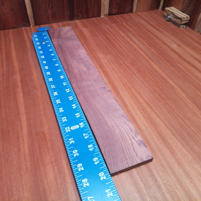 Discover the rich tonal qualities of our Honduran Rosewood blank, perfect for luthiers seeking high-quality acoustic projects. Its stunning rift-sawn grain not only provides aesthetic appeal but also contributes to exceptional sound clarity. Elevate your craftsmanship with this beautiful piece that resonates with warmth and richness, ideal for creating striking instruments that stand out. It is a Honduran Rosewood Acoustic Rift Sawn fingerboard blank with dimensions of 20.1 x 2.9 x 0.4 inches.