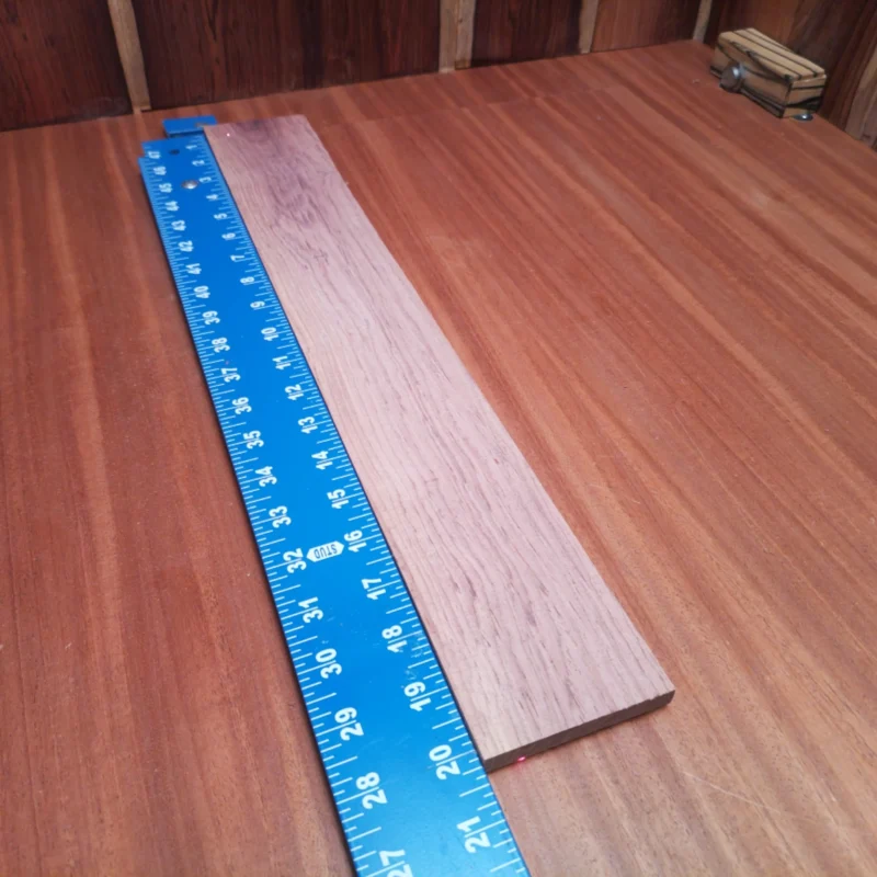 Unlock your creativity with this Honduran Rosewood fingerboard blank! Perfectly rift sawn, it delivers stunning tonal qualities and an impressive aesthetic for any guitar project. Luthiers will appreciate its workability and durability, making it an ideal choice for crafting the ultimate acoustic instrument. Transform your designs and experience rich tones and a smooth playing surface that will stand out in any setting. It is a Honduran Rosewood Acoustic Rift Sawn fingerboard blank with dimensions of 20.2 x 2.9 x 0.4 inches.