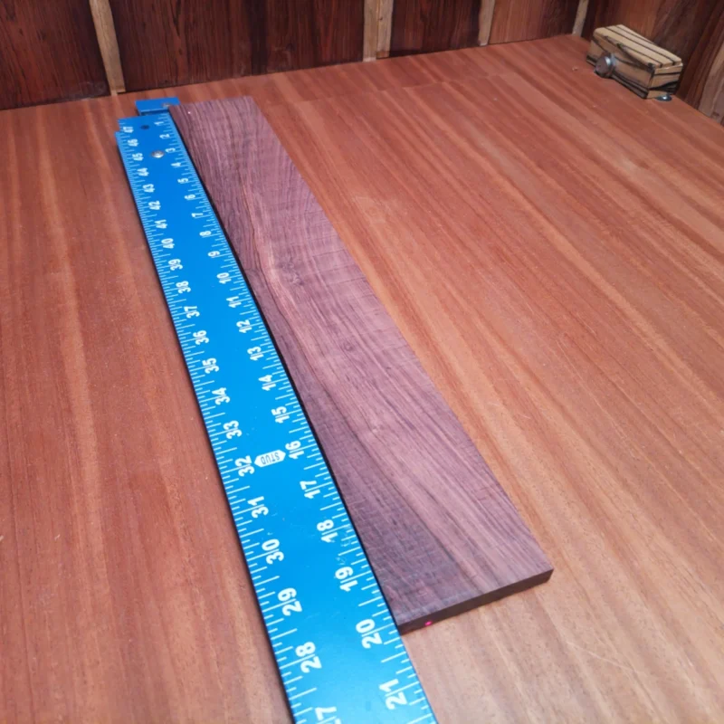 Craft your next masterpiece with this premium Honduran Rosewood blank. Known for its rich tone and stunning visual appeal, this wood is a luthier's dream. Perfect for acoustic instruments, it ensures great resonance and durability. Whether you're building a guitar or enhancing your collection, this rift sawn blank promises superior playability and a classic look. Get ready to elevate your craft and produce exceptional sound! It is a Honduran Rosewood Acoustic Rift Sawn fingerboard blank with dimensions of 20.0 x 2.9 x 0.4 inches.