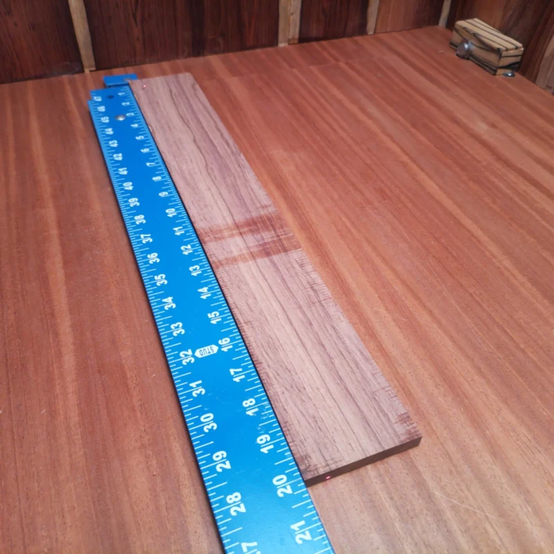 Honduran Rosewood Acoustic Rift Sawn Fingerboard Blank 0.4" X 2.8" X 20.1" - HRAFBR000286 3 Crafted from beautiful Honduran Rosewood, this fingerboard blank offers both beauty and durability. Ideal for luthiers seeking premium materials, its rift-sawn grain showcases striking visual appeal while providing excellent tonal qualities. At 0.4