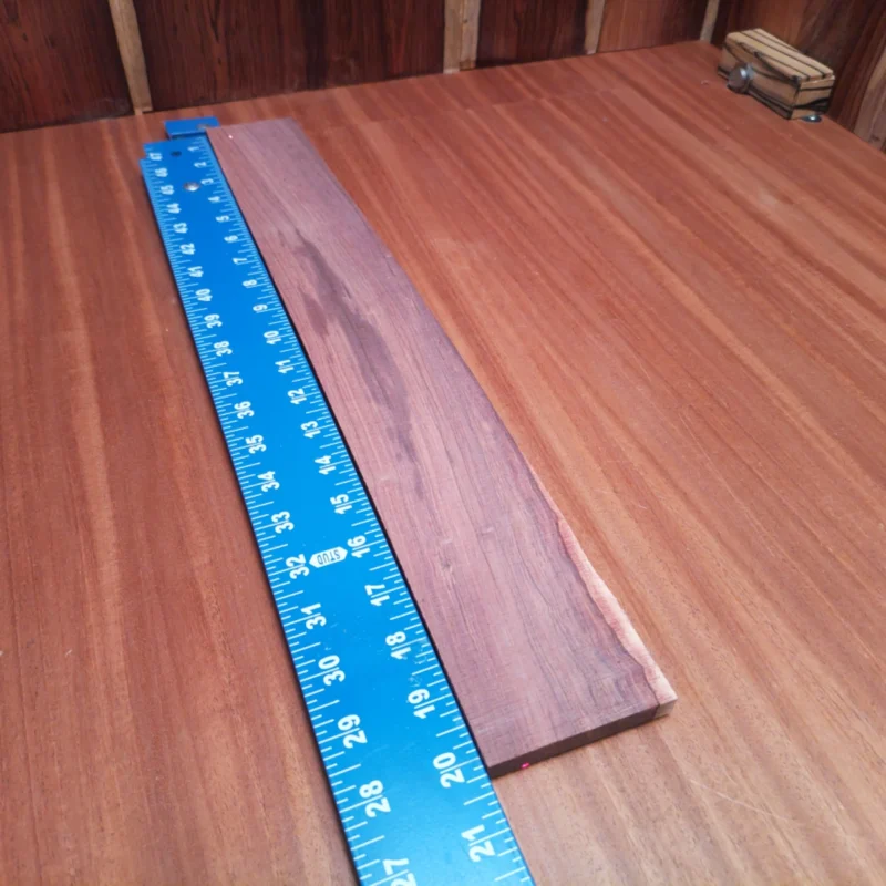 Fingerboard Blanks 77 Dive into luthiery with our Honduran Rosewood fingerboard blank. This premium acoustic-grade rift sawn piece is ideal for crafting stunning fingerboards that resonate beautifully. With its rich tone and striking grain patterns, your instruments will not just sound amazing, but look fantastic too! Perfect for experienced luthiers or energetic enthusiasts looking to create their next masterpiece. It is a Honduran Rosewood Acoustic Rift Sawn fingerboard blank with dimensions of 20.2 x 2.5 x 0.4 inches.