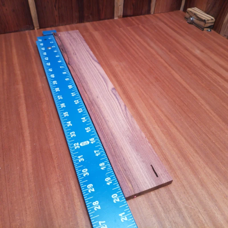 Enhance your luthier projects with premium Honduran rosewood. This acoustic blank offers stunning aesthetics and tonal quality. Its rift-sawn design ensures stable grain patterns, making it perfect for crafting beautiful instruments. With its exceptional durability and resonance, you'll create masterpieces that stand the test of time. Ideal for acoustic guitar backs, sides, and more, this fingerboards blank will elevate your musical creations to new heights. It is a Honduran Rosewood Acoustic Rift Sawn fingerboard blank with dimensions of 20.2 x 2.9 x 0.4 inches.