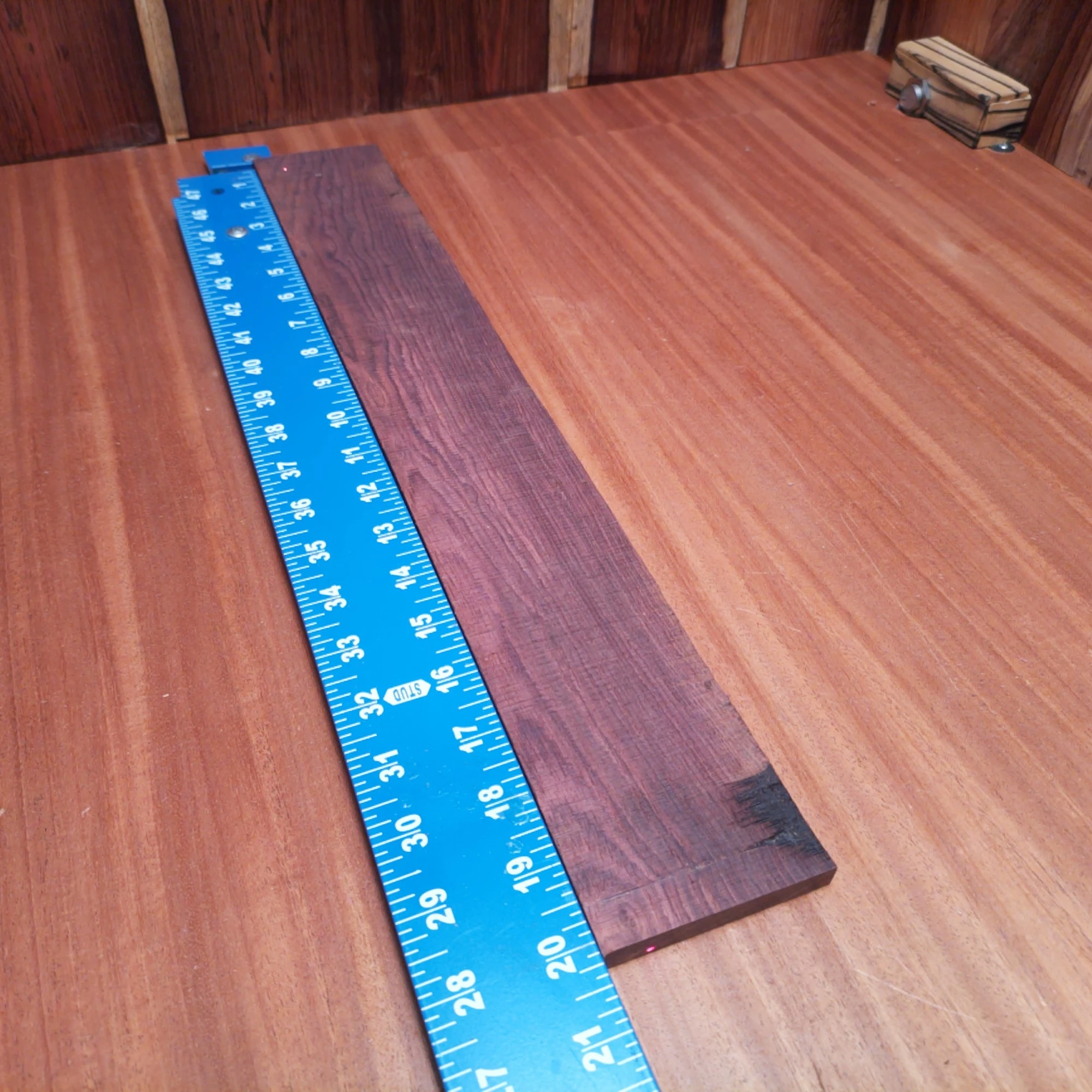 Honduran Rosewood Acoustic Rift Sawn Fingerboard Blank 0.4" X 2.9" X 20.1" - HRAFBR000305 2 Elevate your crafting with this Honduran Rosewood blank, perfect for luthiers seeking rich tonal quality. The fine rift sawn dimensions of 0.4" thick and 2.9" wide ensure easy handling and precision when sculpting your next masterpiece. Whether you’re constructing an acoustic or perfecting a custom design, this premium wood offers stunning aesthetics and durability to make your instrument stand out in sound and style. It is a Honduran Rosewood Acoustic Rift Sawn fingerboard blank with dimensions of 20.1 x 2.9 x 0.4 inches.