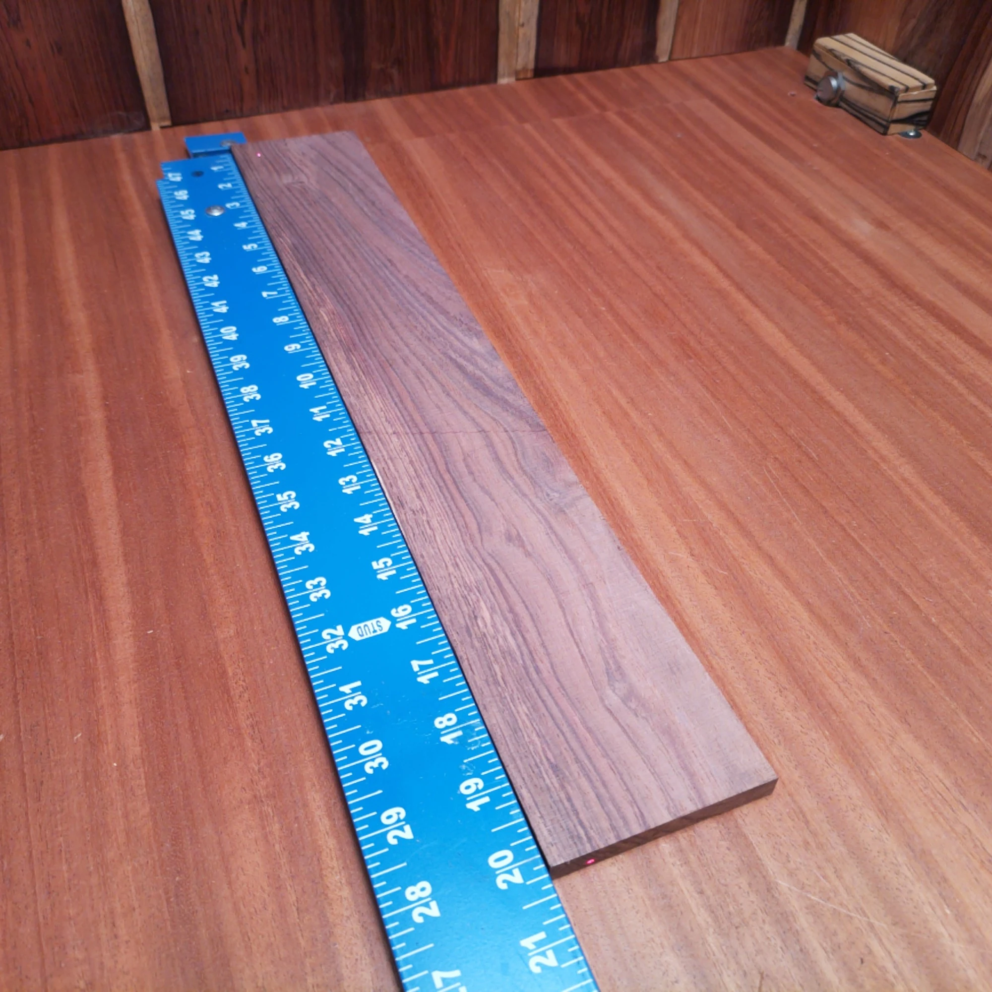 Honduran Rosewood Acoustic Rift Sawn Fingerboard Blank 0.4" X 3.2" X 20.1" - HRAFBR000309 2 Elevate your luthiery game with this rift-sawn Honduran rosewood fingerboard blank. Known for its rich tone and warmth, this premium wood is ideal for crafting acoustic guitars. Perfectly sized, it boasts superior durability while providing a visually stunning finish to your instrument. Experience the difference with this exquisite tonewood as you create your next masterpiece. It is a Honduran Rosewood Acoustic Rift Sawn fingerboard blank with dimensions of 20.1 x 3.2 x 0.4 inches.
